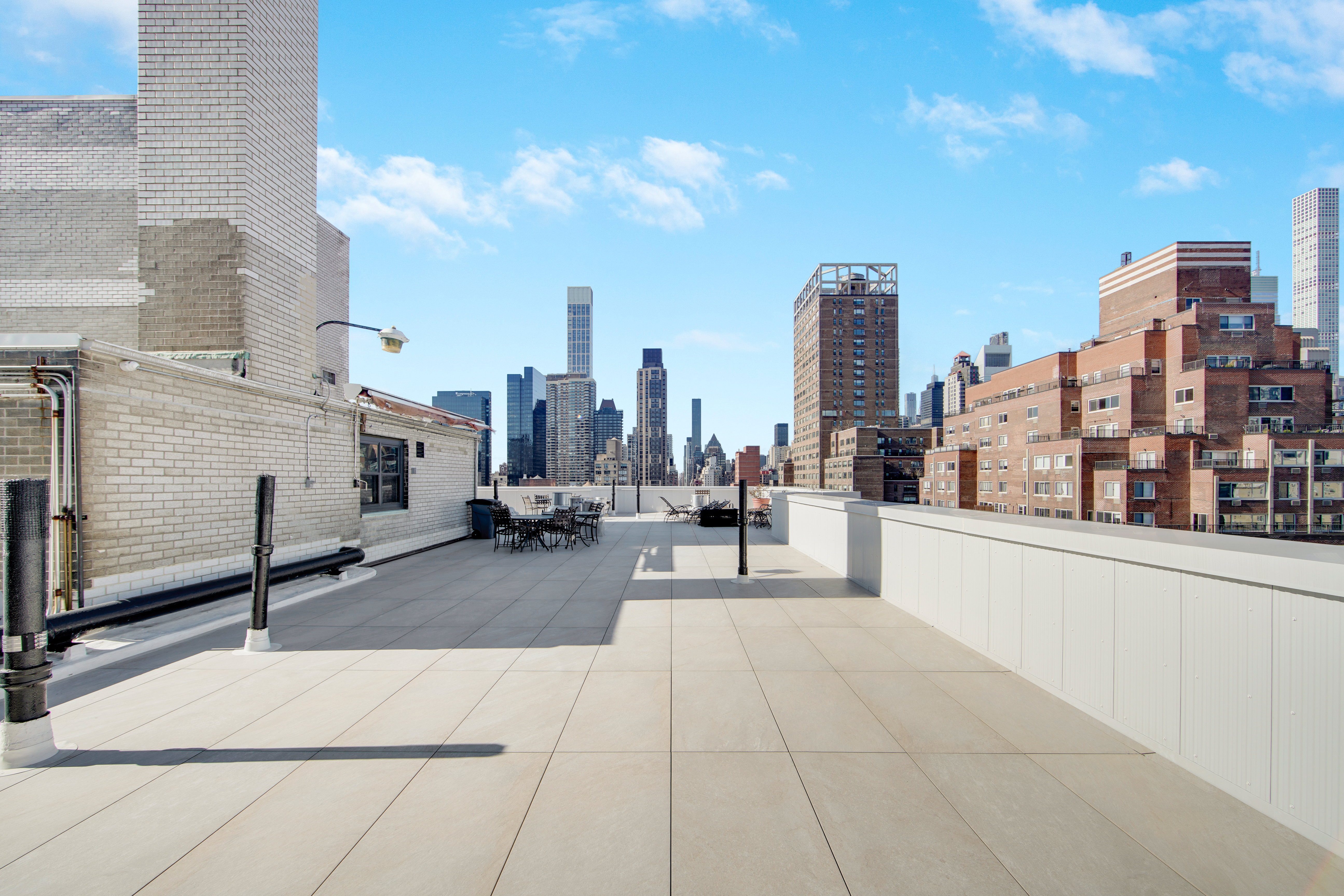 401 East 65th Street, Unit 10H Manhattan, NY 10065 - Photo 12 of 14 a building with view of building