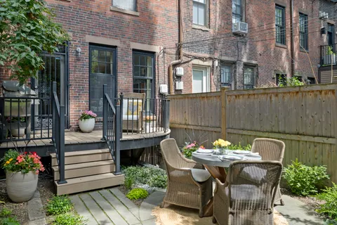 a view of a table and chairs in the patio