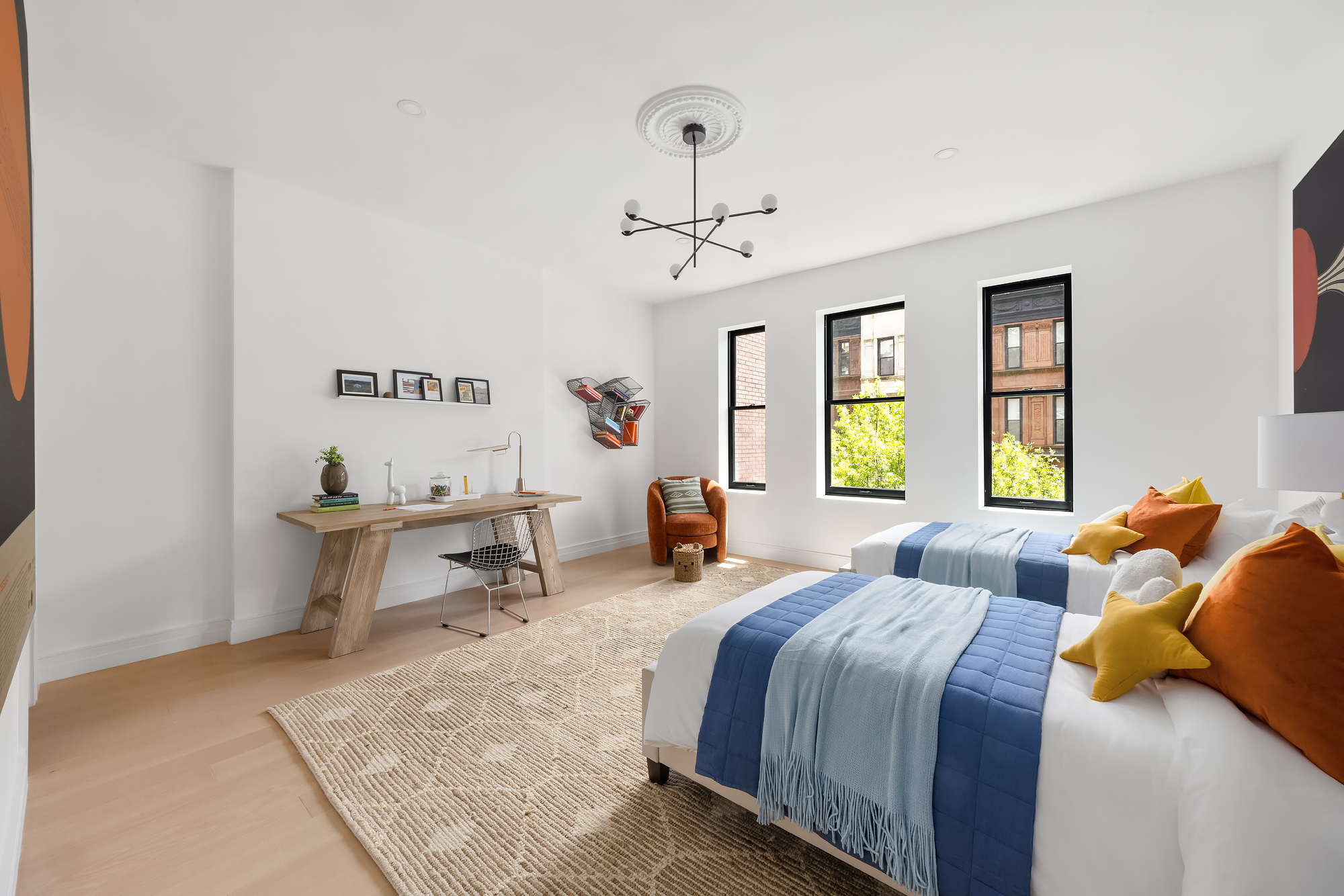 53 West 85th Street Manhattan, NY 10024 - Photo 26 of 37 a bedroom with a bed and a window