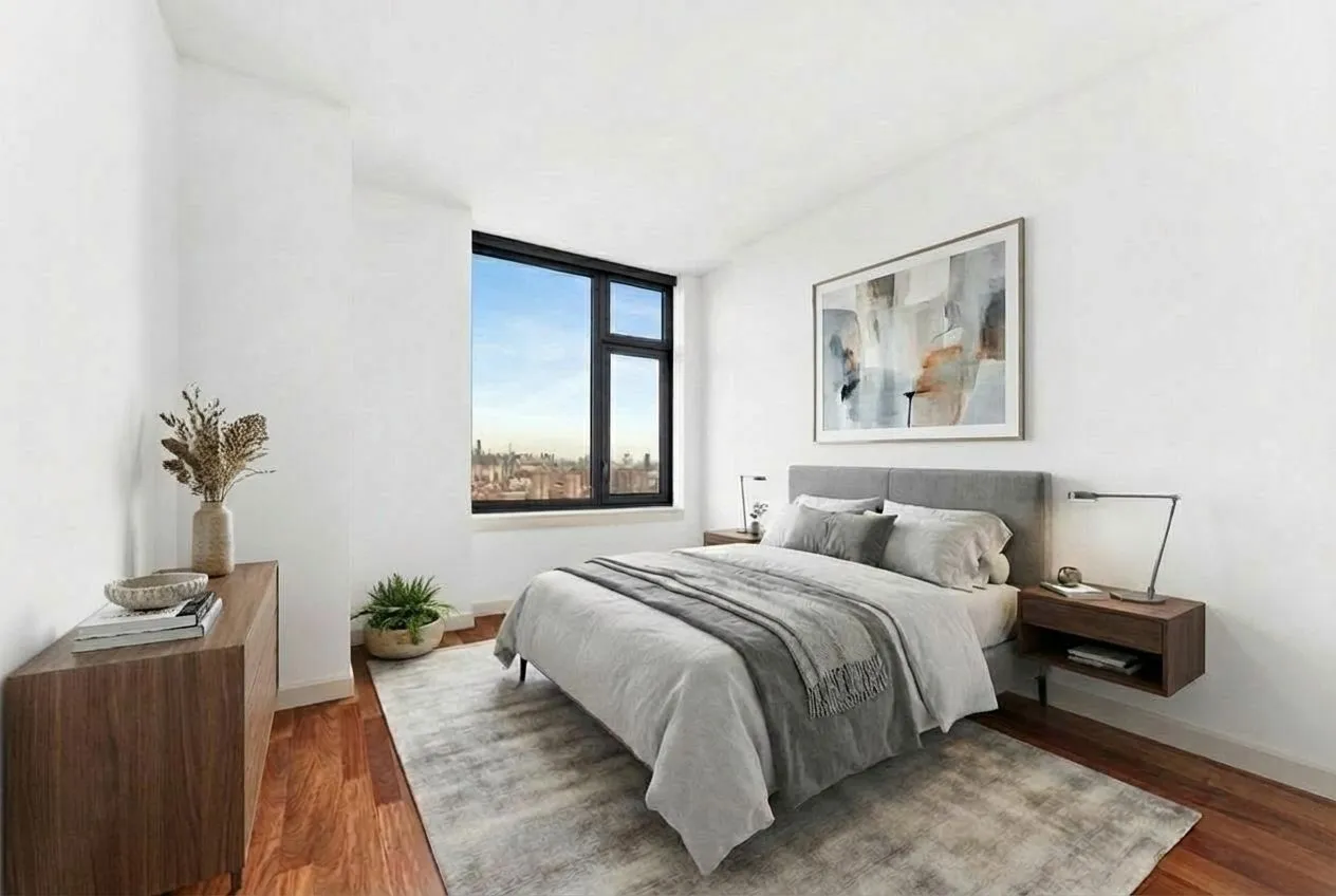 a bedroom with a bed and a couch