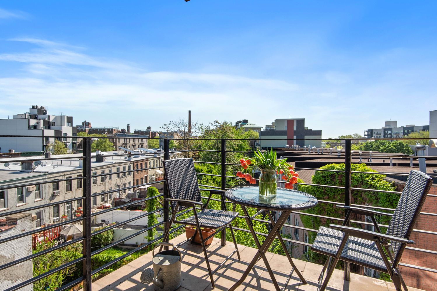 179 Woodpoint Road, Unit 4A Brooklyn, NY 11211 - Photo 6 of 16 a view of a chairs and table in the terrace