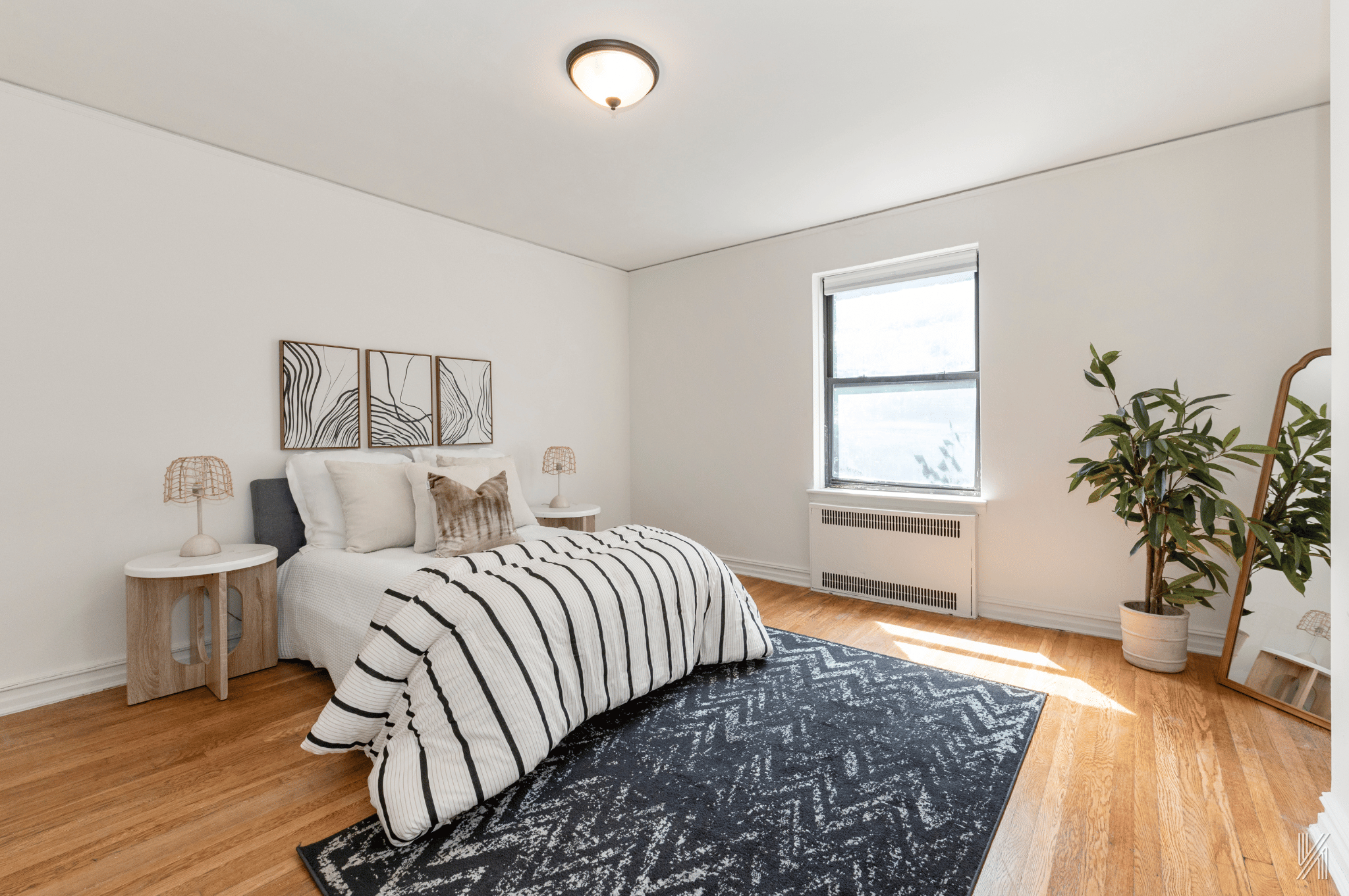 35-35 75th Street, Unit 428 Queens, NY 11372 - Photo 14 of 21 a bedroom with a bed and a window