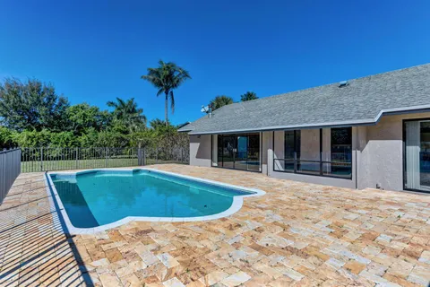 a view of outdoor space yard and swimming pool