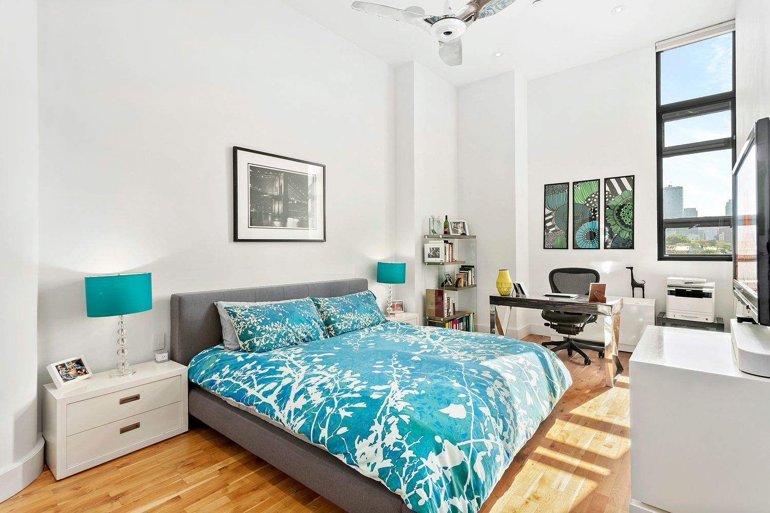 360 Furman Street, Unit 510 Brooklyn, NY 11201 - Photo 4 of 35 a bedroom with a bed and a large window