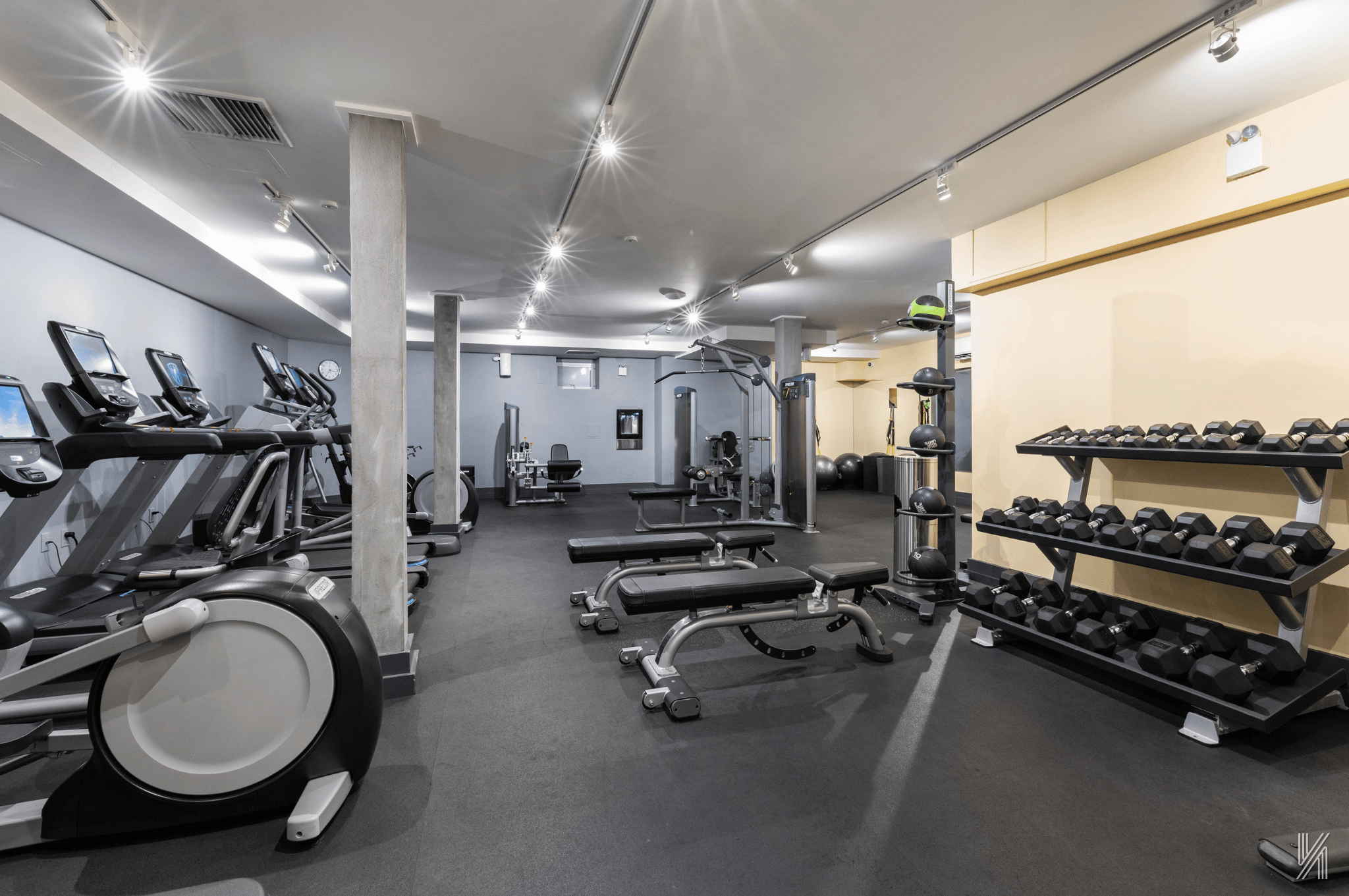73-12 35th Avenue, Unit E23 Queens, NY 11372 - Photo 13 of 16 a view of a room with gym equipment