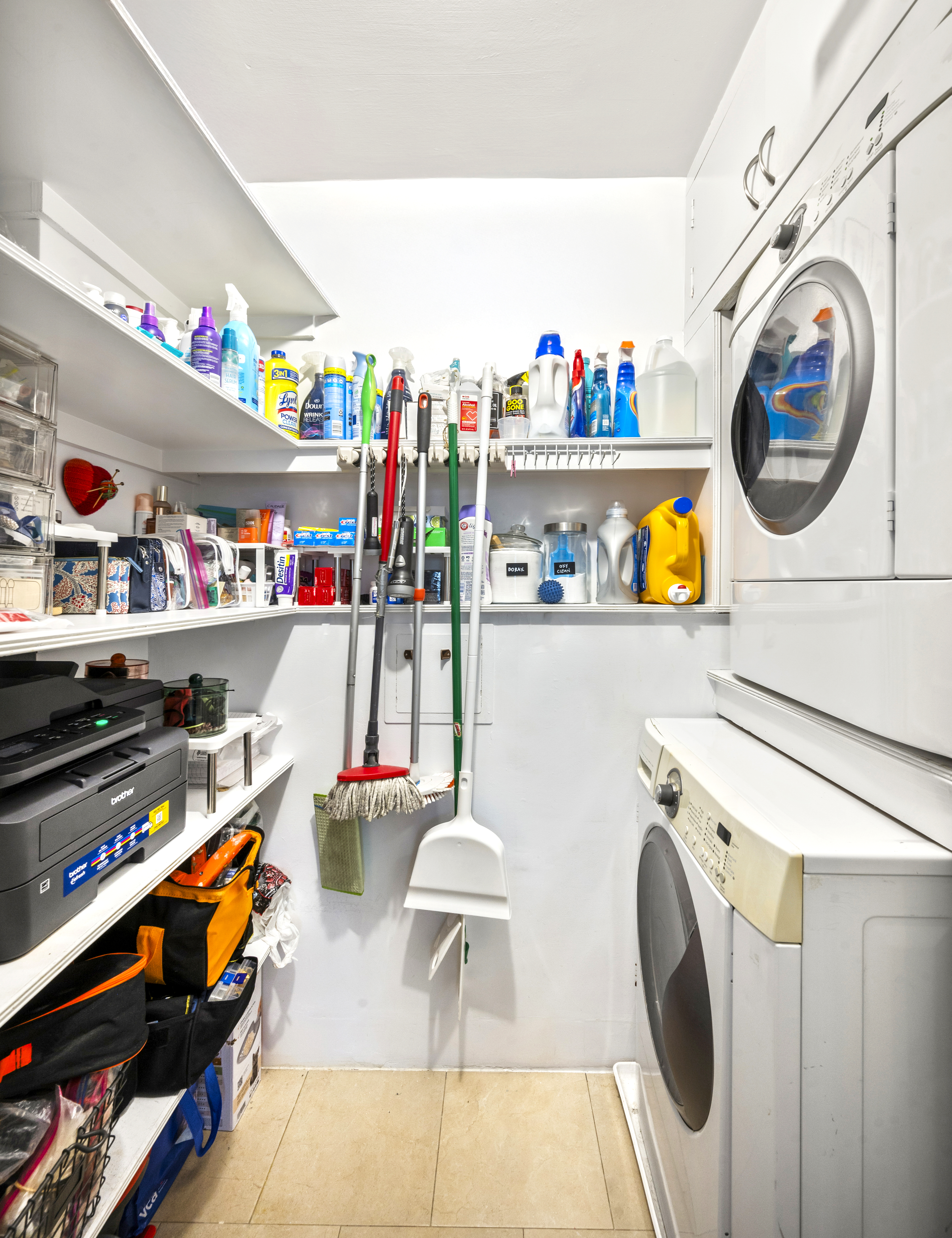 201 East 79th Street, Unit 6A Manhattan, NY 10075 - Photo 10 of 11 a utility room with dryer and washer