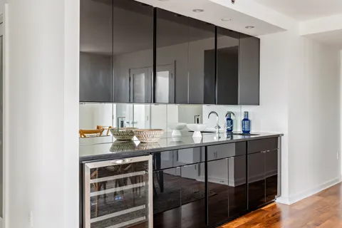 a bathroom with a sink double vanity and a mirror