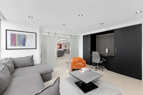 a living room with furniture and a couch