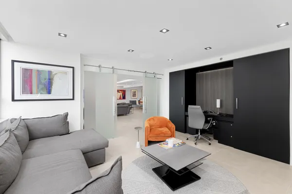 a living room with furniture and a couch
