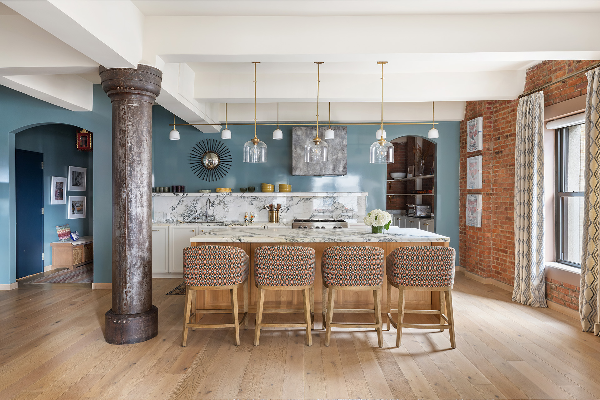 380 West 12th Street, Unit 6CD Manhattan, NY 10014 - Photo 7 of 19 a dining room with furniture wooden floor a rug and a chandelier