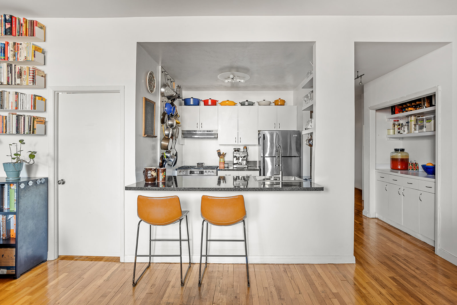 88 Wyckoff Street, Unit 4F Brooklyn, NY 11201 - Photo 3 of 12 a kitchen with stainless steel appliances granite countertop a refrigerator and microwave
