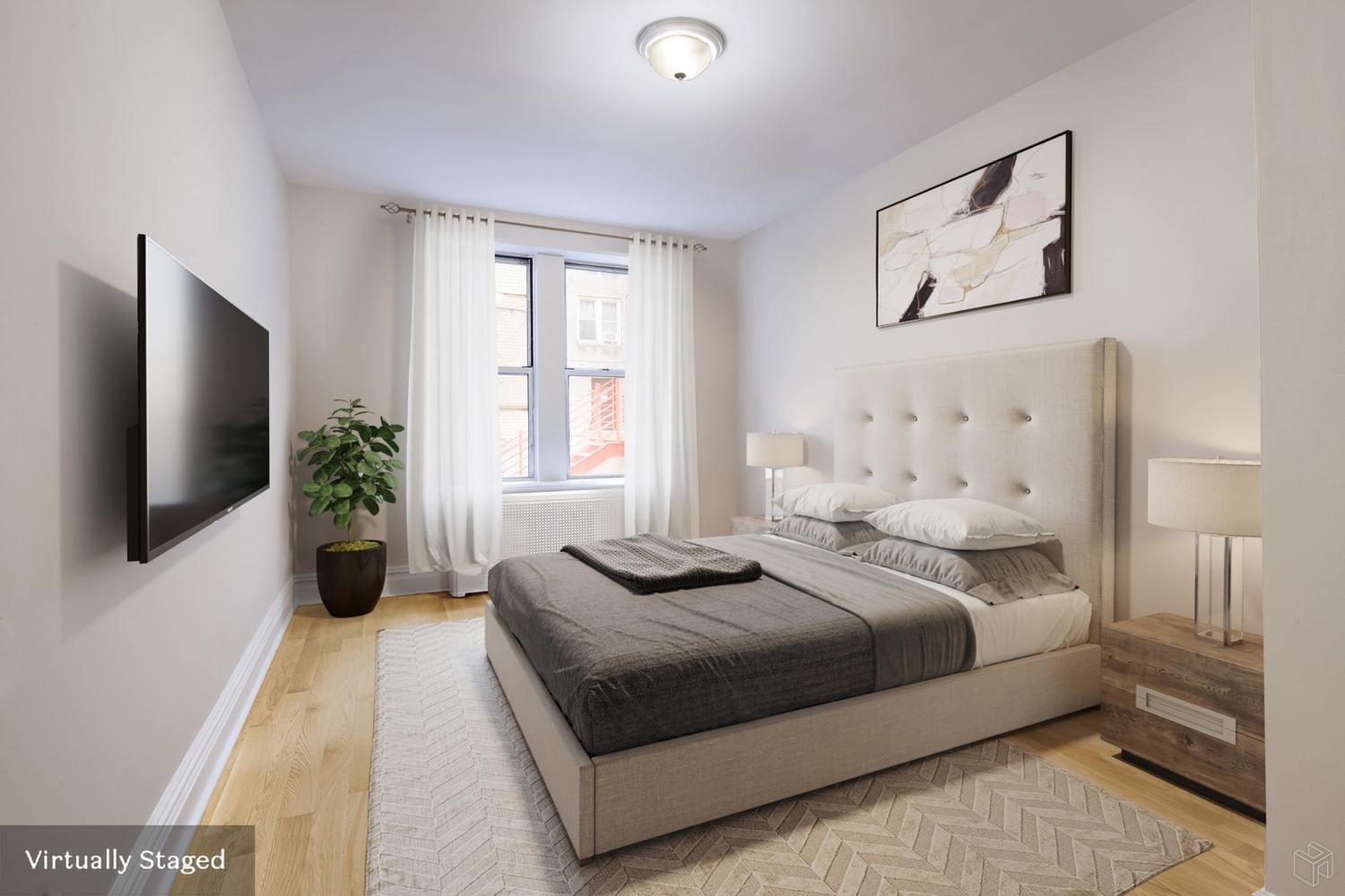 156-08 Riverside Drive West, Unit 1K Manhattan, NY 10032 - Photo 3 of 7 a bedroom with a bed and a flat screen tv