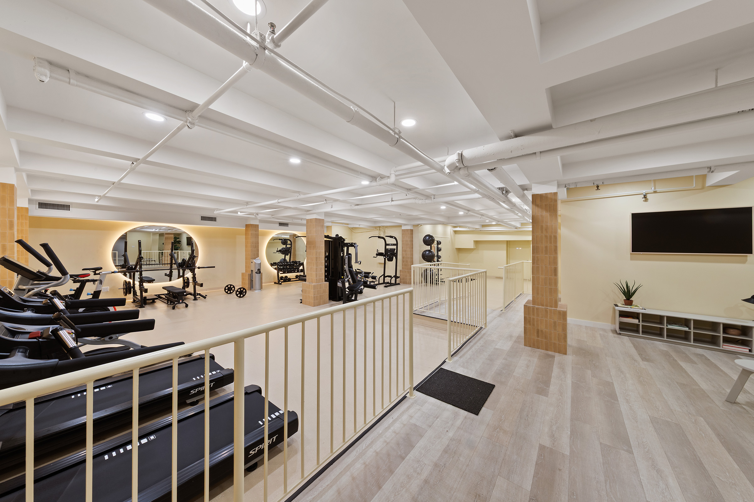 194 East 2nd Street, Unit 2C Manhattan, NY 10009 - Photo 9 of 17 a view of a room with gym equipment