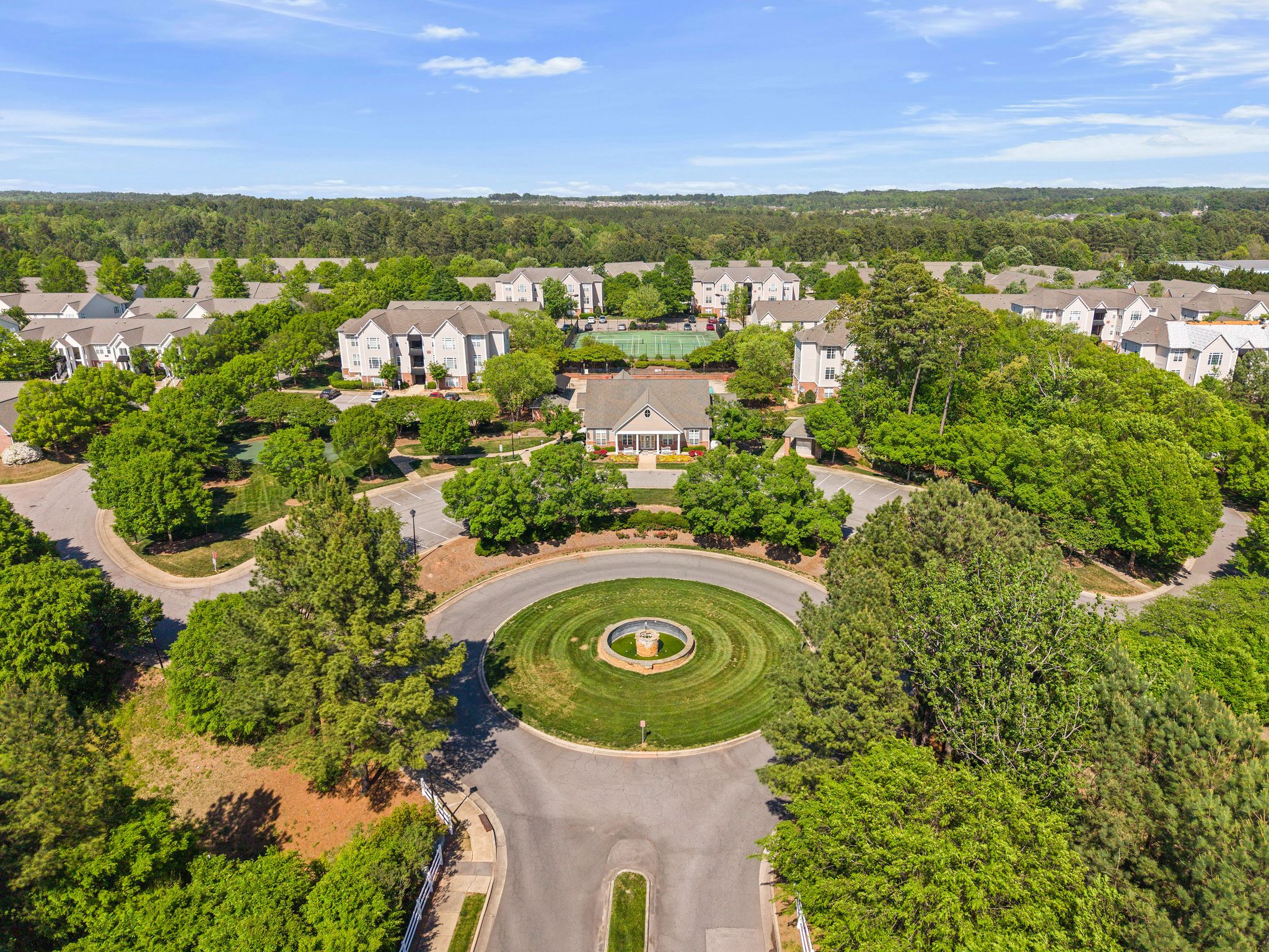 Huntscroft Lane Raleigh, NC 27617 - Photo 11 of 49 a view of a city with lush green forest