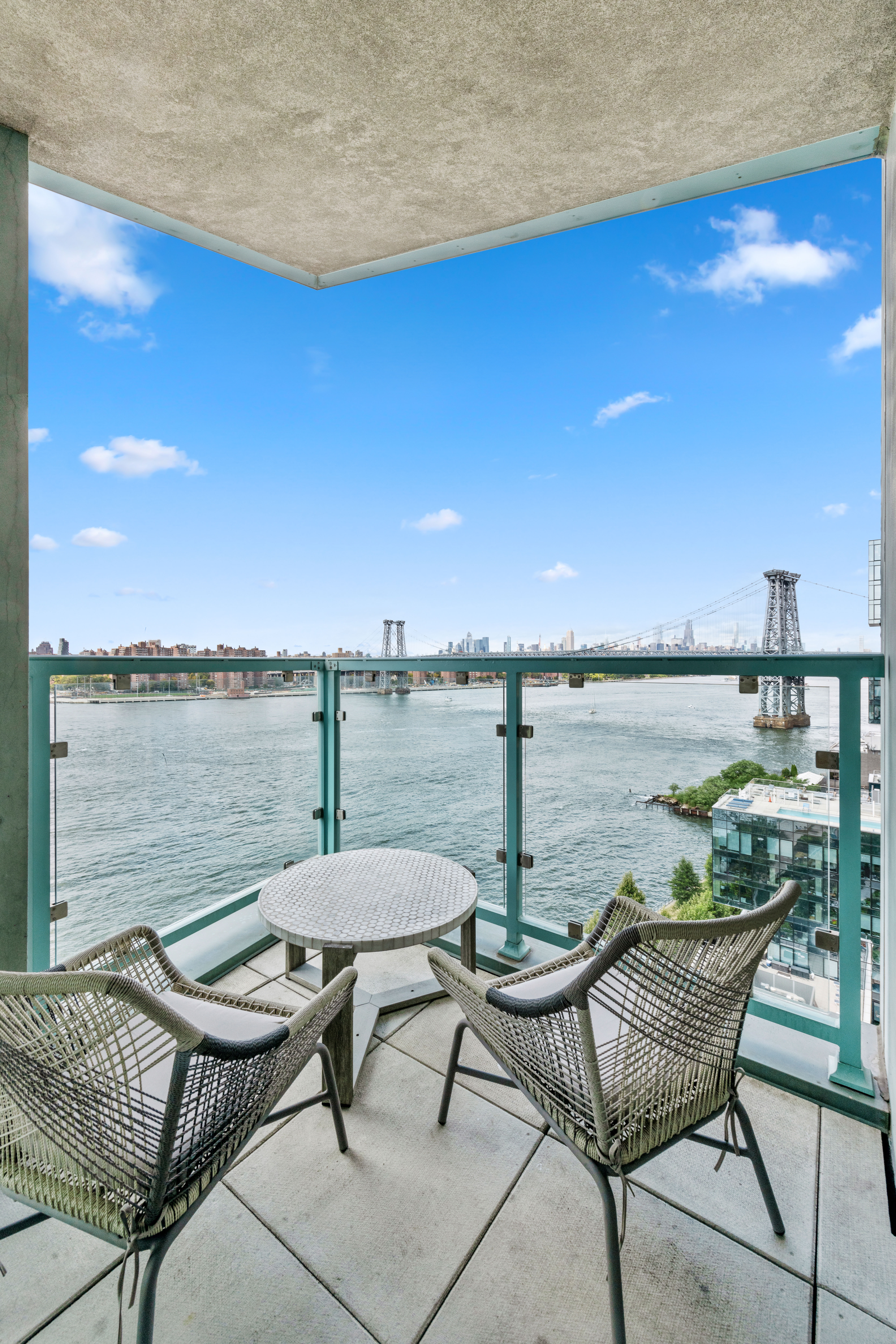 446 Kent Avenue, Unit 14A Brooklyn, NY 11249 - Photo 7 of 19 a view of a terrace with furniture