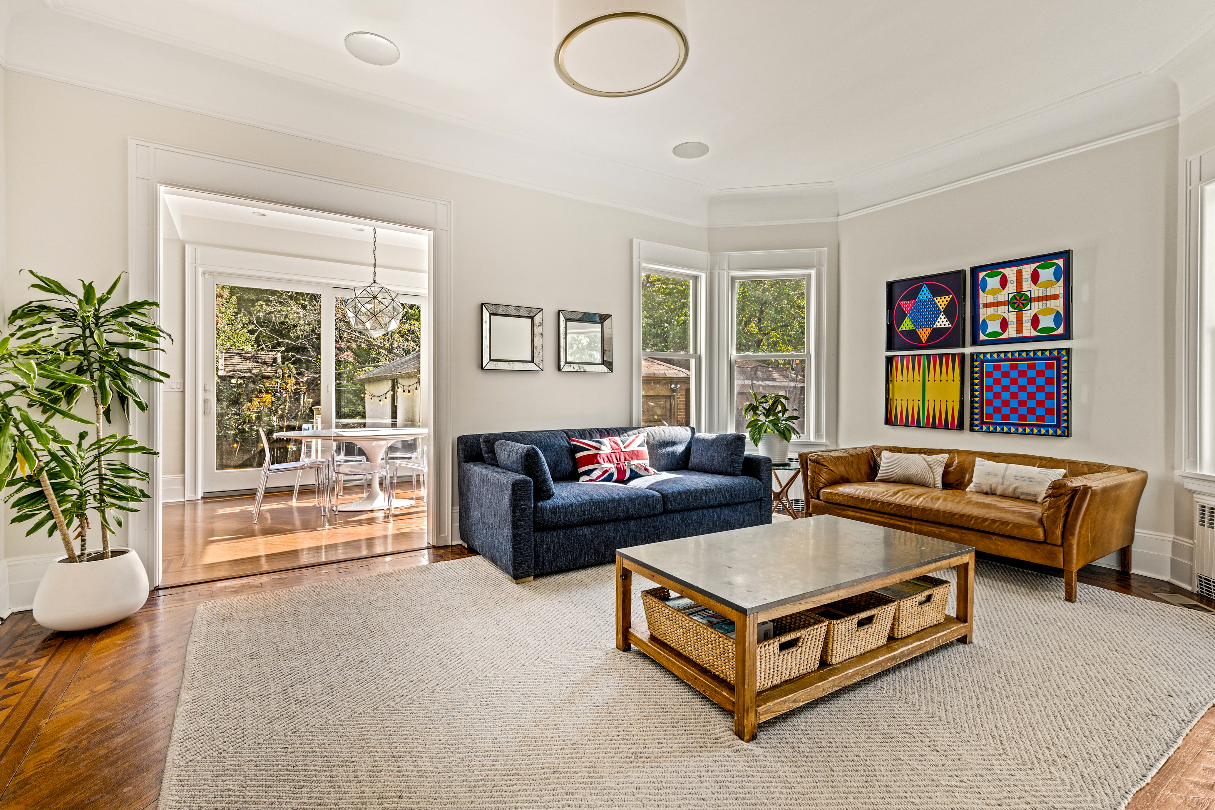 689 East 17th Street Brooklyn, NY 11230 - Photo 8 of 28 a living room with furniture and a potted plant