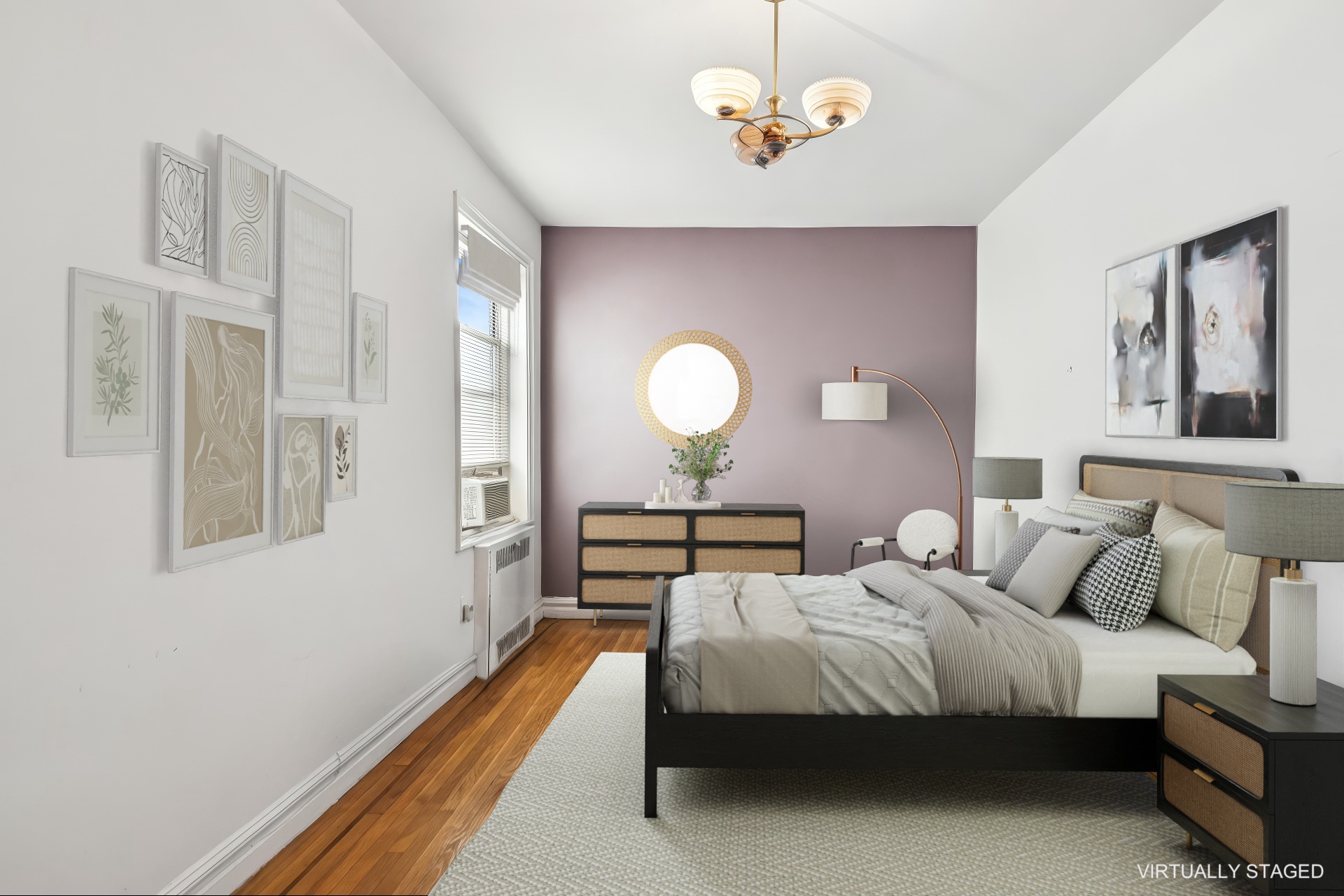 91 Payson Avenue, Unit 4D Manhattan, NY 10034 - Photo 11 of 24 a bedroom with bed and a chandelier