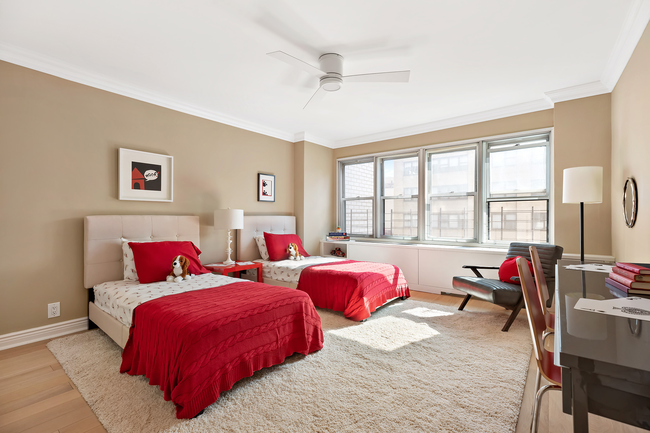 155 East 38th Street, Unit 12K Manhattan, NY 10016 - Photo 12 of 15 a bedroom with two beds and a large window