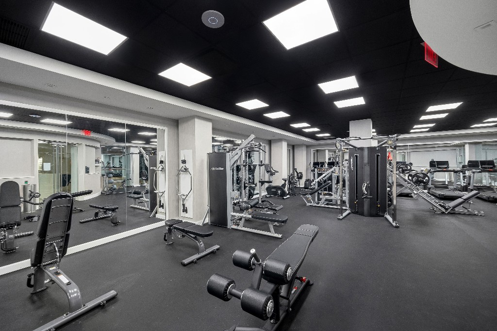 111 Fulton Street, Unit 824 Manhattan, NY 10038 - Photo 13 of 35 a view of a room with gym equipment