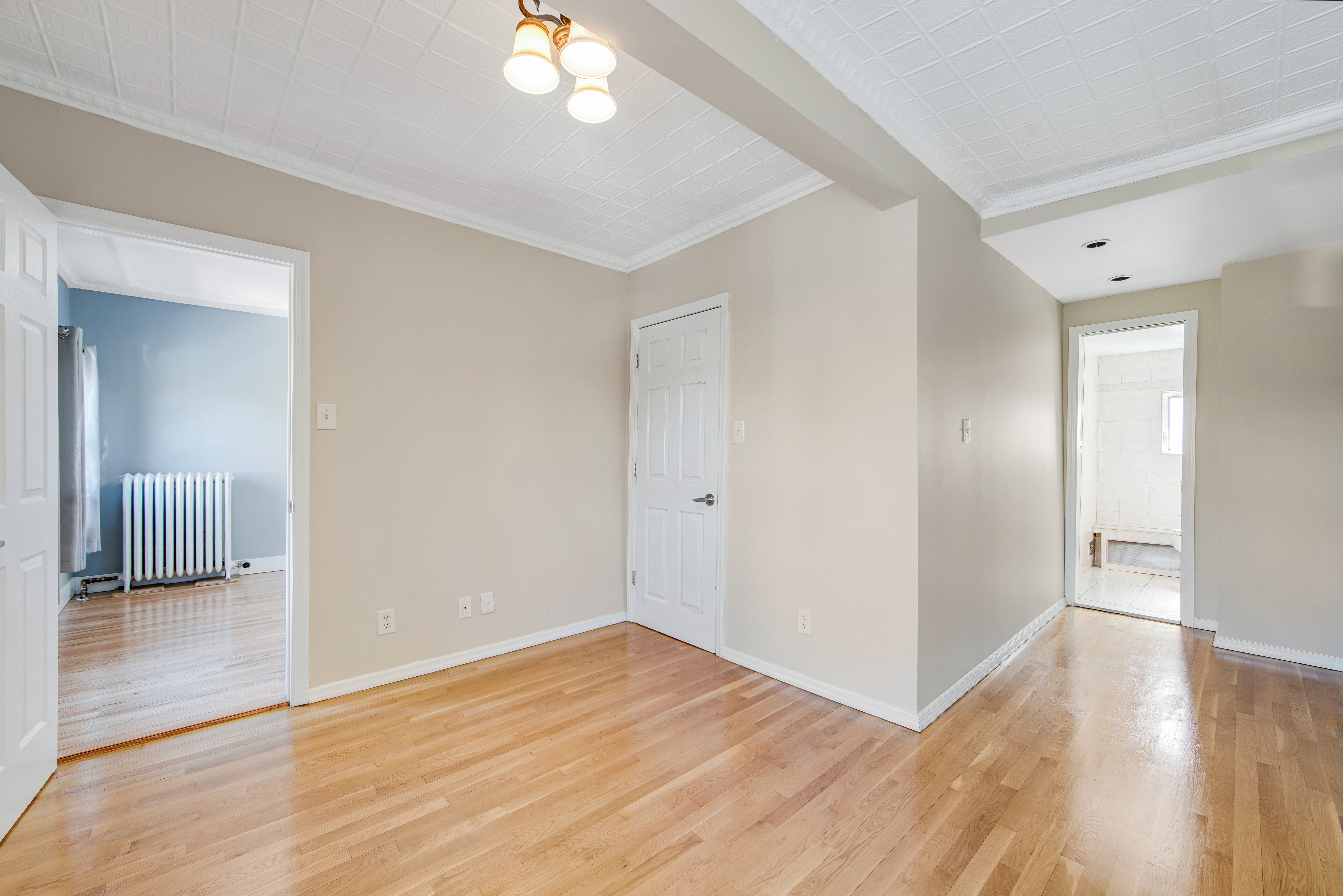 296 17th Street Brooklyn, NY 11215 - Photo 6 of 8 a view of empty room with wooden floor