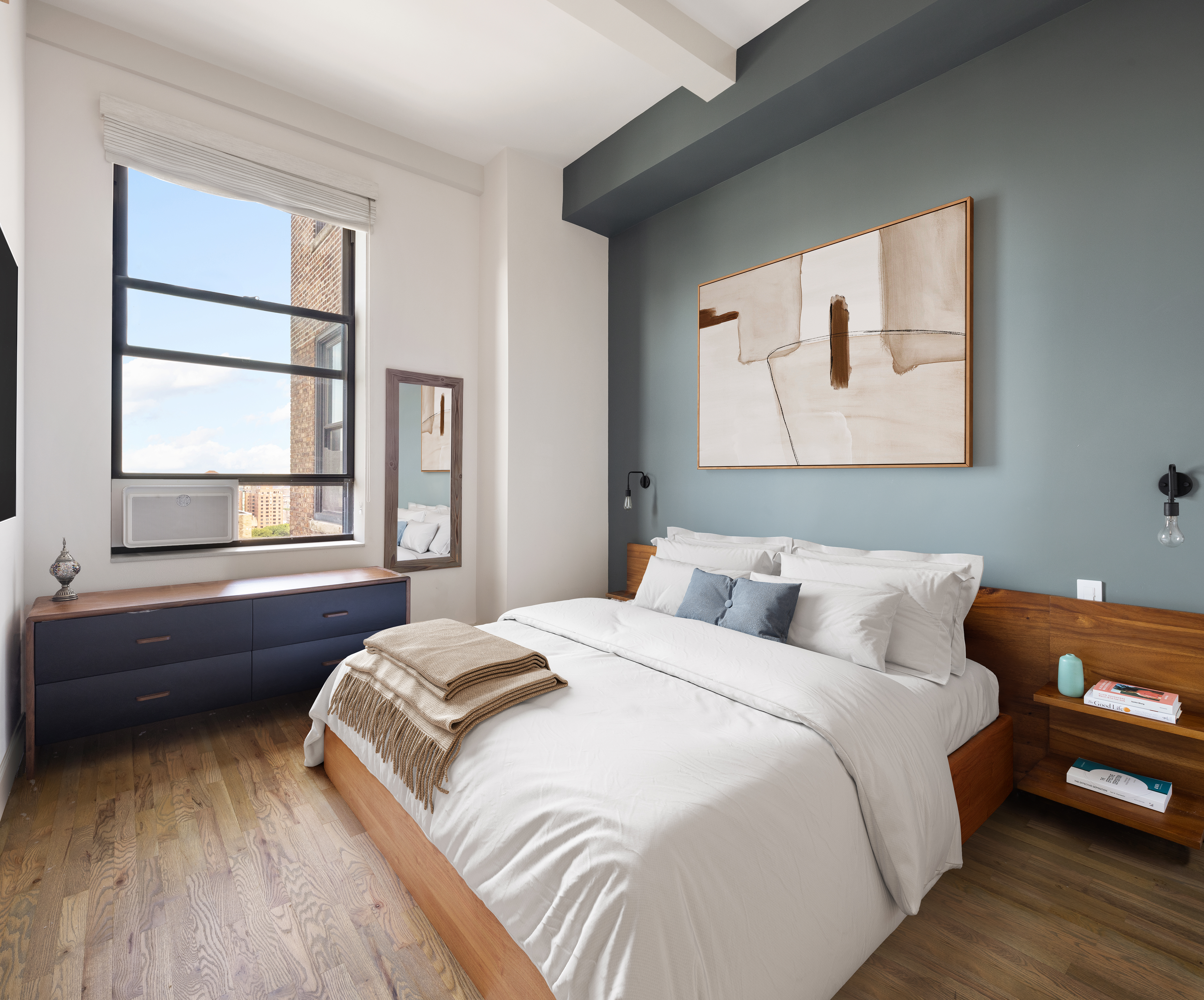 250 Mercer Street, Unit B1401 Manhattan, NY 10012 - Photo 5 of 8 a bedroom with a bed and a window