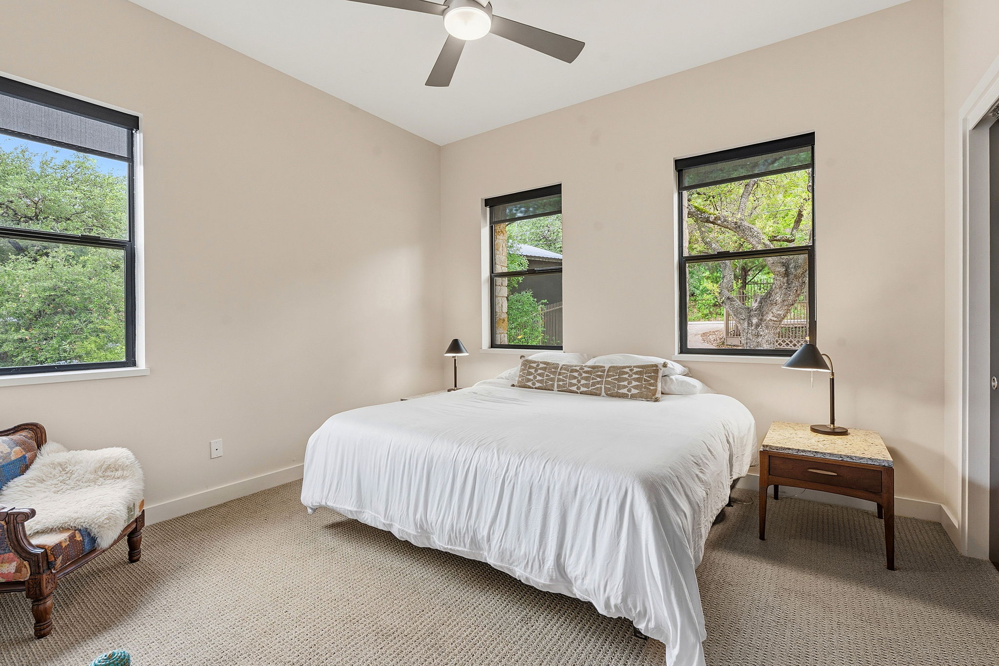 3605 Robbins Road Austin, TX 78730 - Photo 25 of 51 a bedroom with a bed chair and window