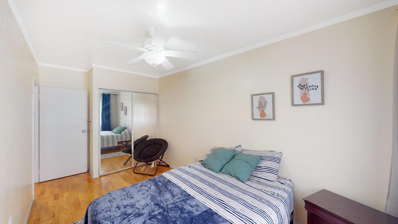 495 Central Avenue, Unit 2 Brooklyn, NY 11221 - Photo 12 of 19 a living room with furniture and a rug