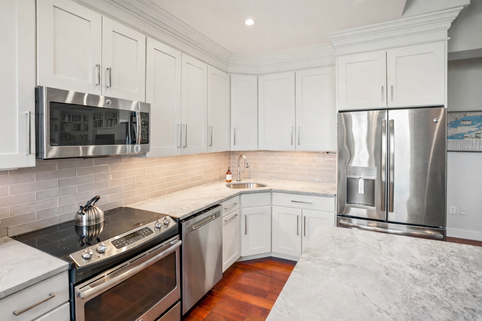 2123 California Street Northwest, Unit D5 Washington, DC 20008 - Photo 6 of 25 a kitchen with a sink appliances and cabinets