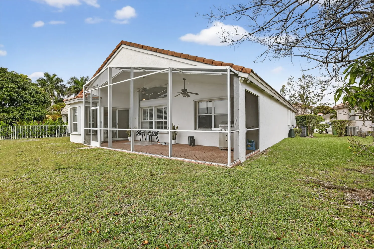 a view of swimming pool with a yard and lake view