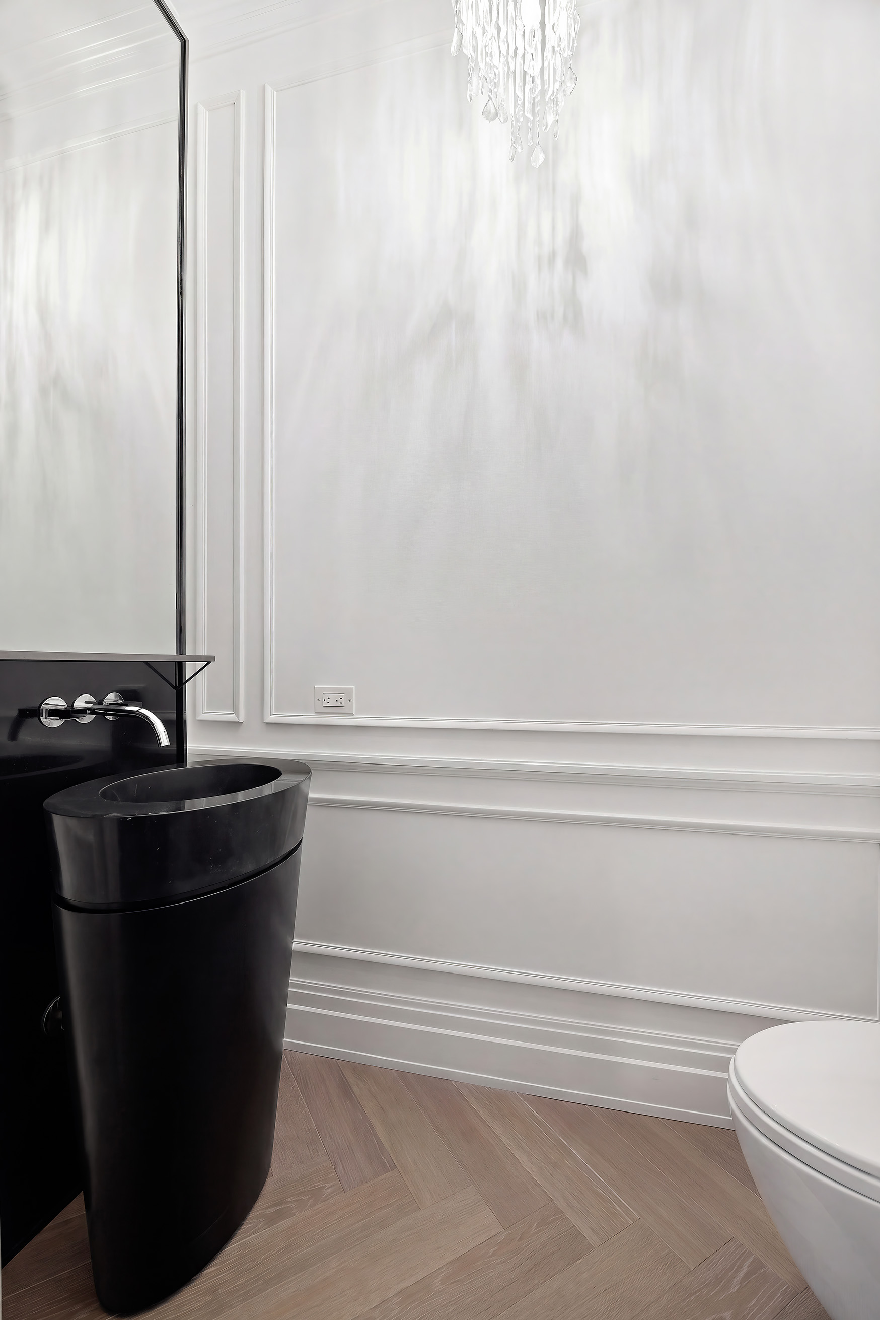 108 Leonard Street, Unit 5A Manhattan, NY 10013 - Photo 9 of 21 a bathroom with a granite countertop sink and toilet
