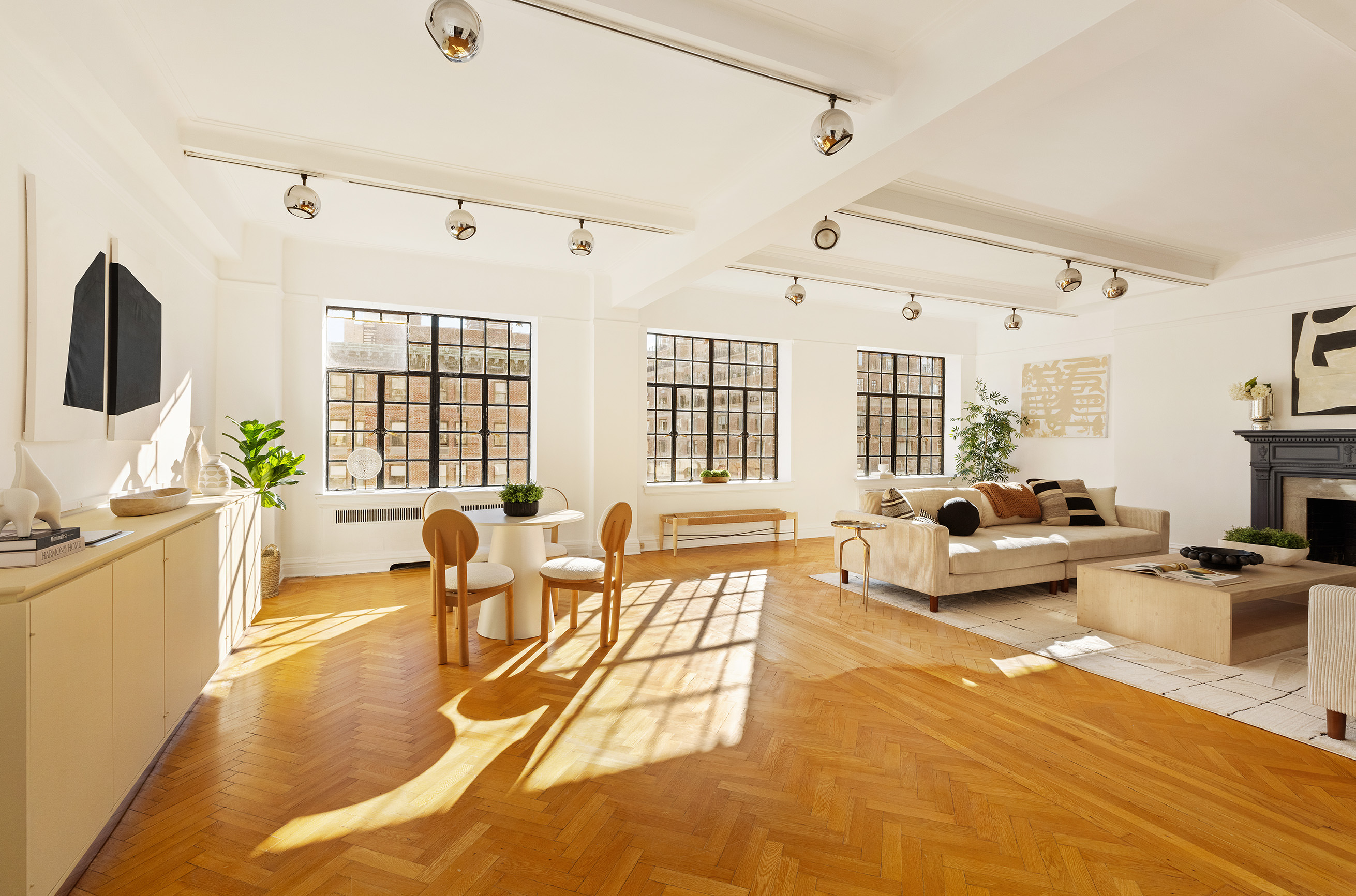 1100 Park Avenue, Unit 14B Manhattan, NY 10128 - Photo 1 of 14 a living room with fireplace furniture and a flat screen tv