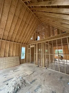 a view of a backyard of a house