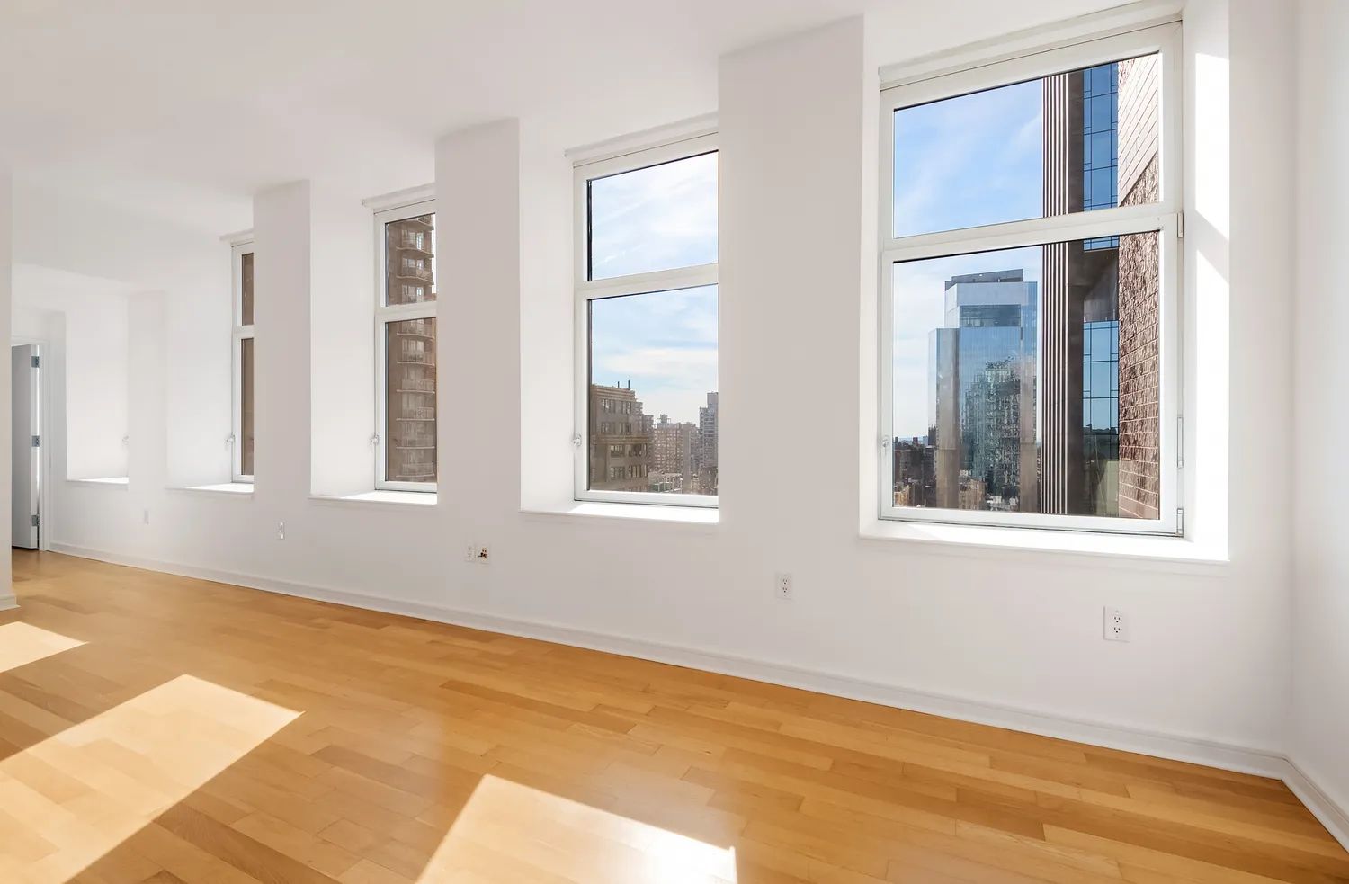 11 East 29th Street, Unit 28B Manhattan, NY 10016 - Photo 3 of 8 a view of an empty room with a window