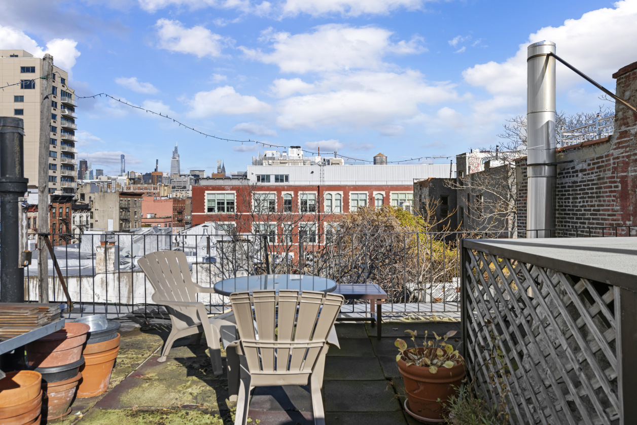 87 St Marks Place, Unit 4E Manhattan, NY 10009 - Photo 6 of 9 a view of a balcony with chairs