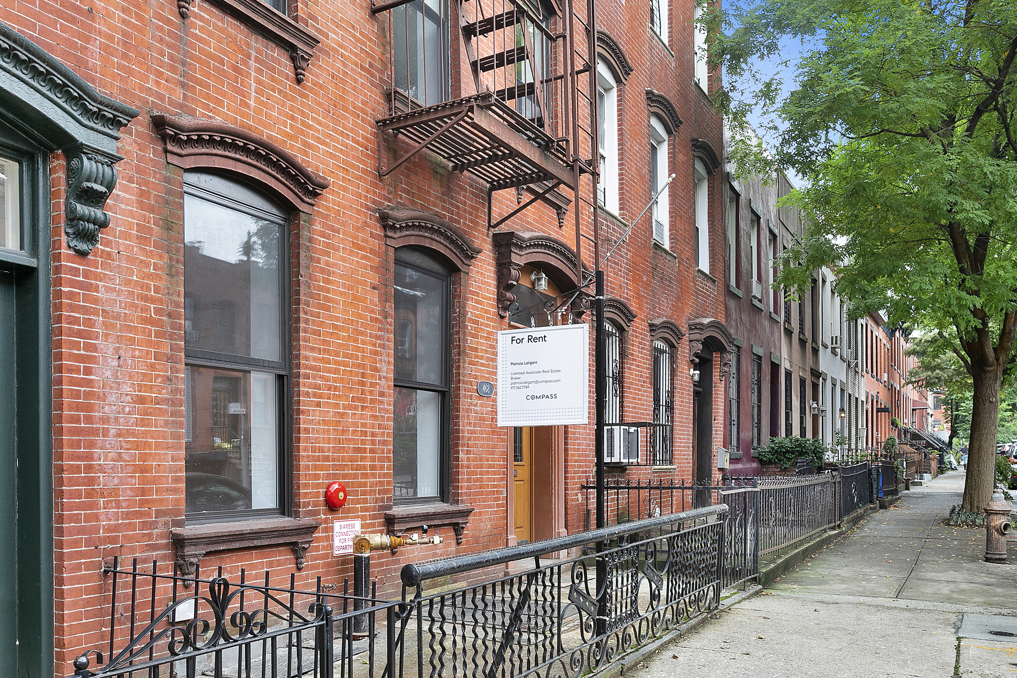 468 Sackett Street, Unit 1 Brooklyn, NY 11231 - Photo 7 of 9 a view of a brick building with many windows