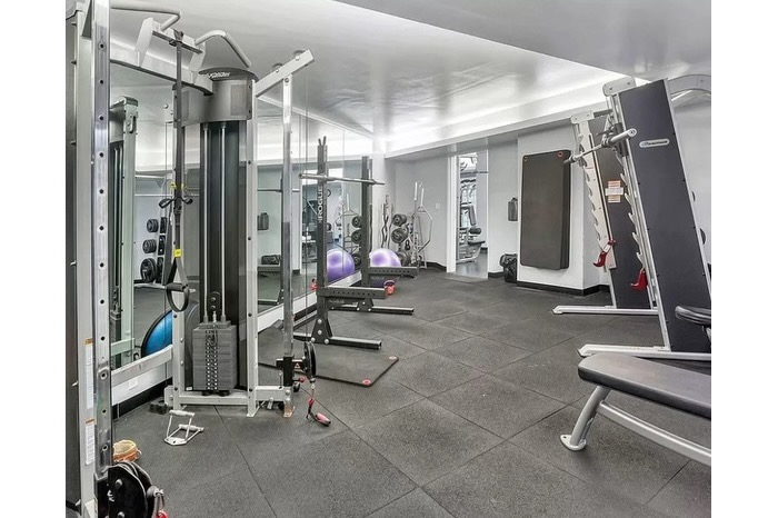 1 Irving Place, Unit U21E Manhattan, NY 10003 - Photo 11 of 16 a view of a room with gym equipment