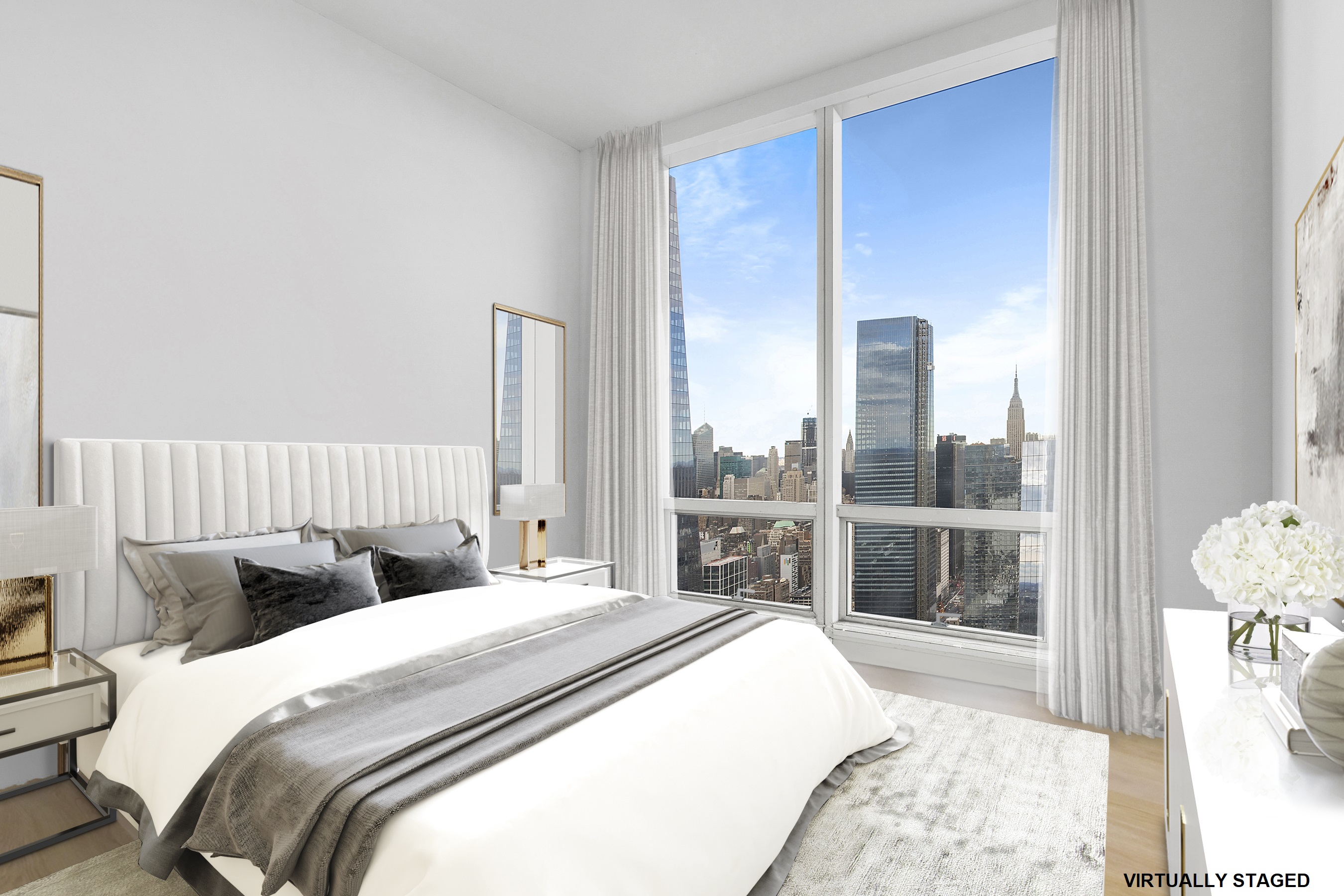 15 Hudson Yards, Unit 75A Manhattan, NY 10001 - Photo 6 of 31 a bedroom with a large bed and a window