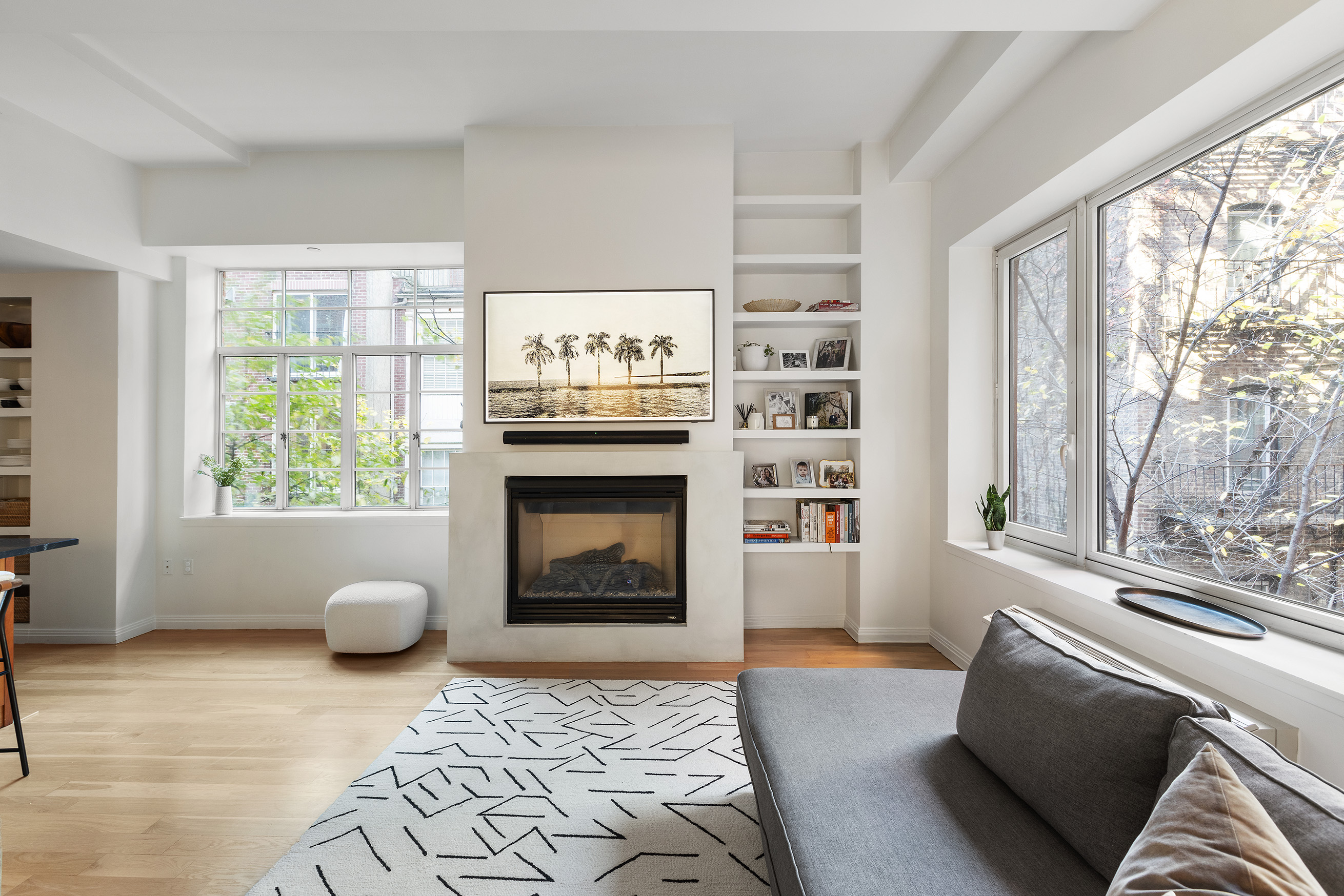 9 College Place, Unit 2K Brooklyn, NY 11201 - Photo 2 of 17 a living room with furniture and a fireplace