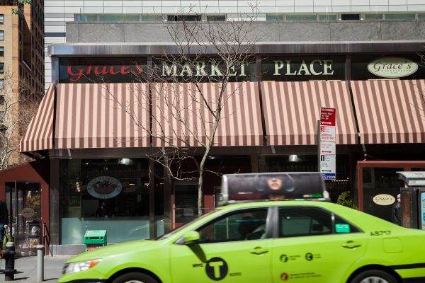 169 East 69th Street, Unit 7/8 B Manhattan, NY 10021 - Photo 26 of 30 a view of a back yard of the house and a car park