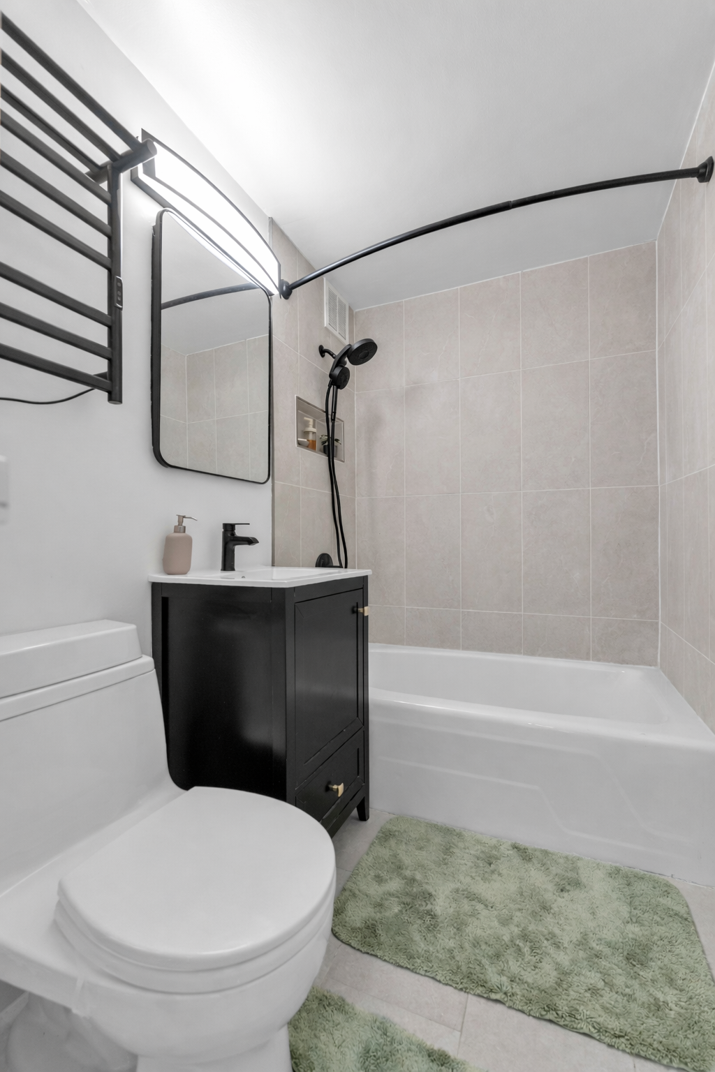 150 West End Avenue, Unit 21M Manhattan, NY 10023 - Photo 8 of 13 a bathroom with a sink a toilet and a mirror