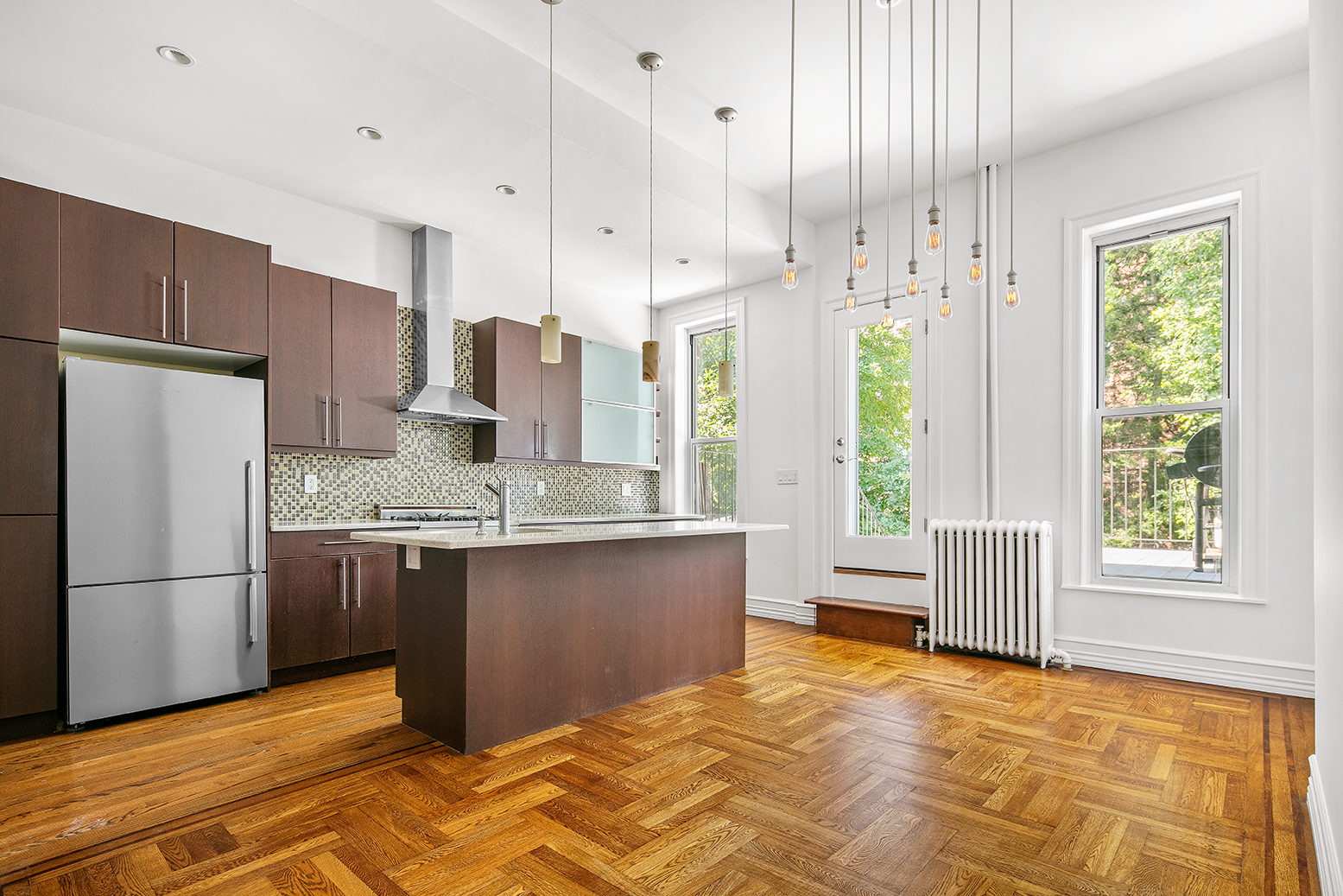 428 5th Street Brooklyn, NY 11215 - Photo 5 of 26 a kitchen with stainless steel appliances granite countertop a refrigerator a sink dishwasher a stove and a refrigerator