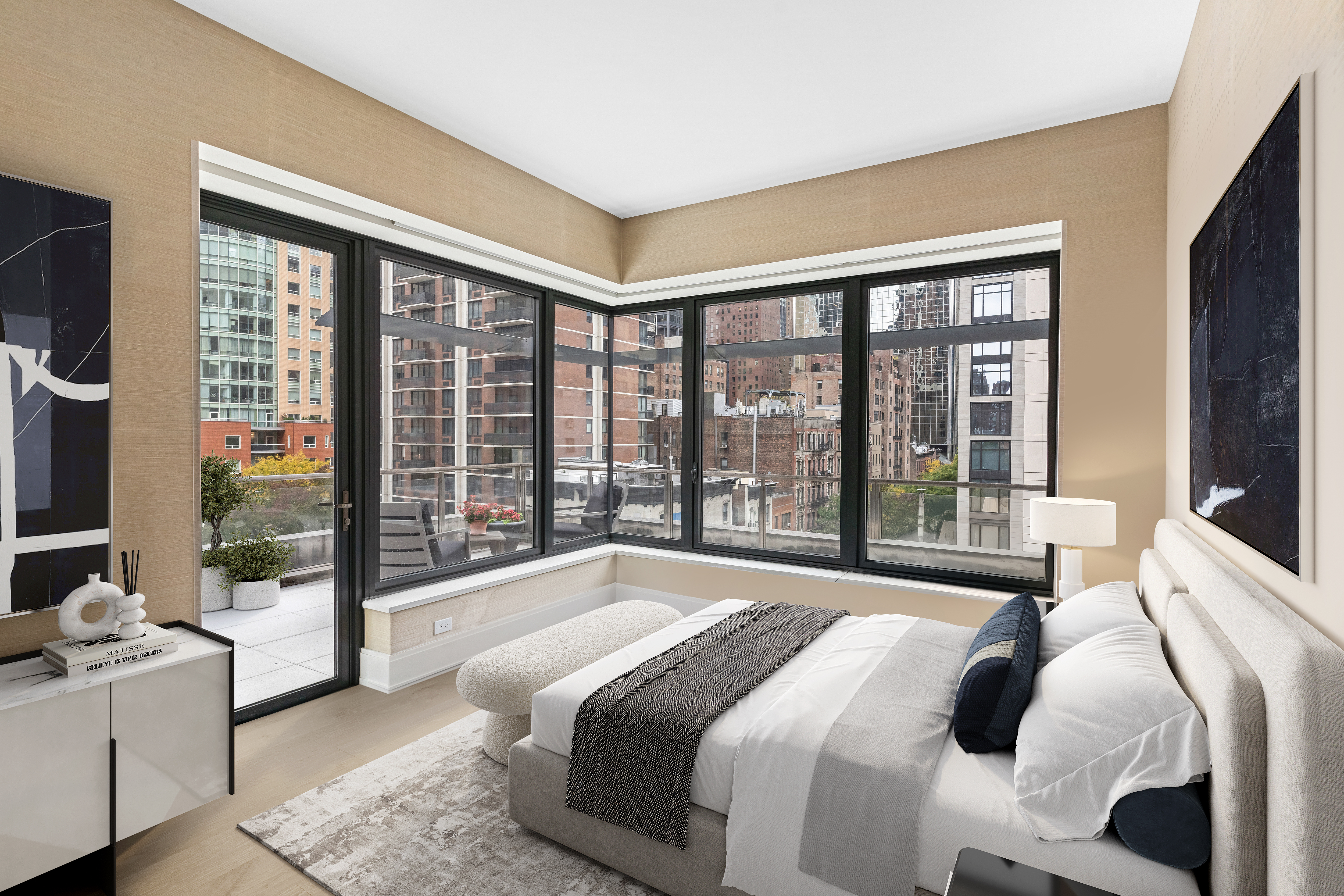 301 East 50th Street, Unit 5A Manhattan, NY 10022 - Photo 6 of 19 a bedroom with a large bed and a large window