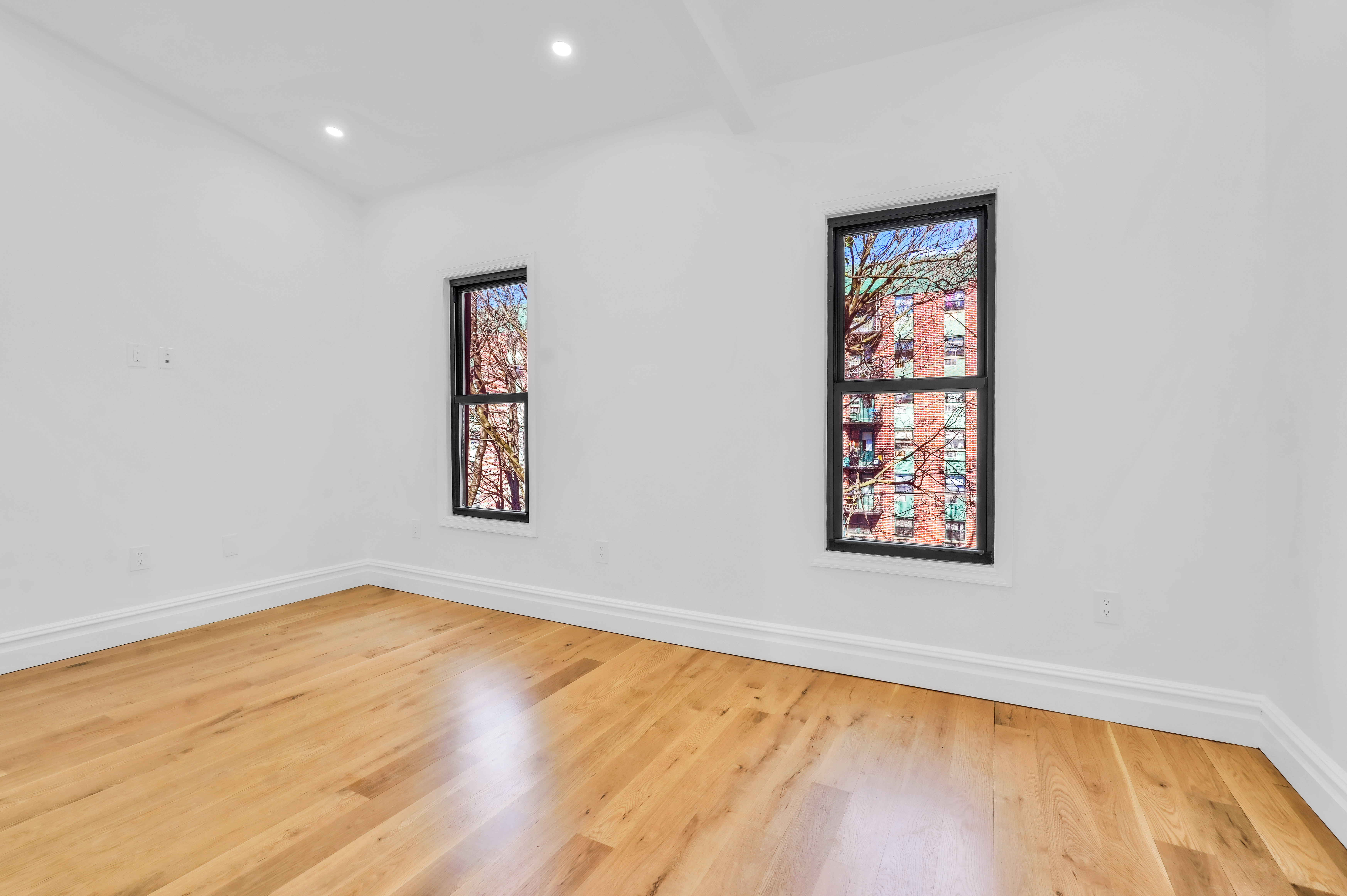 473 Monroe Street Brooklyn, NY 11221 - Photo 23 of 40 an empty room with windows