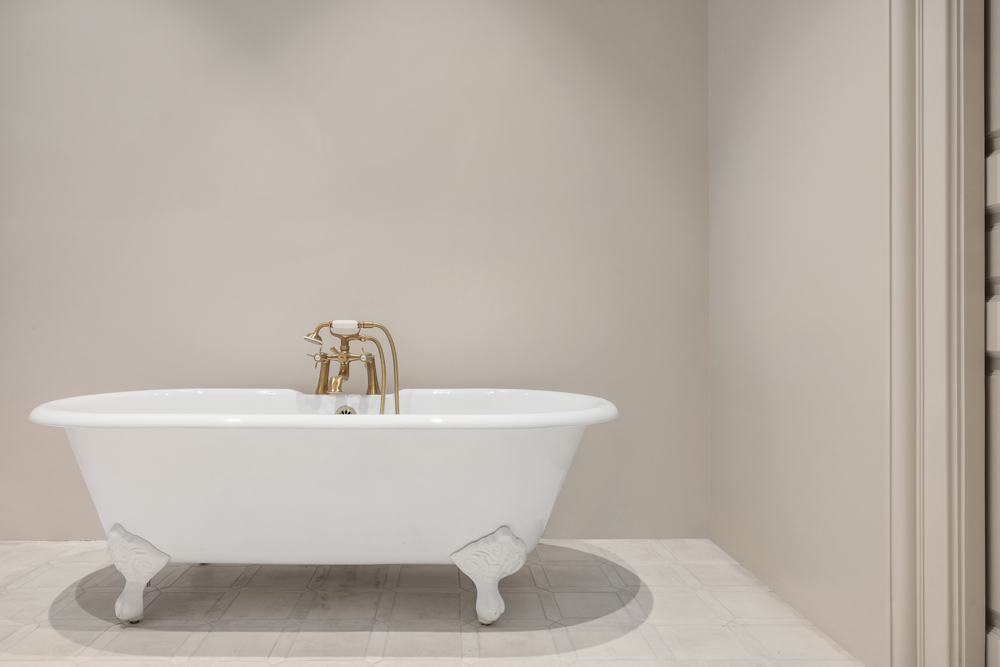 33 West 74th Street, Unit 2 Manhattan, NY 10023 - Photo 12 of 15 a white bath tub sitting in a bathroom