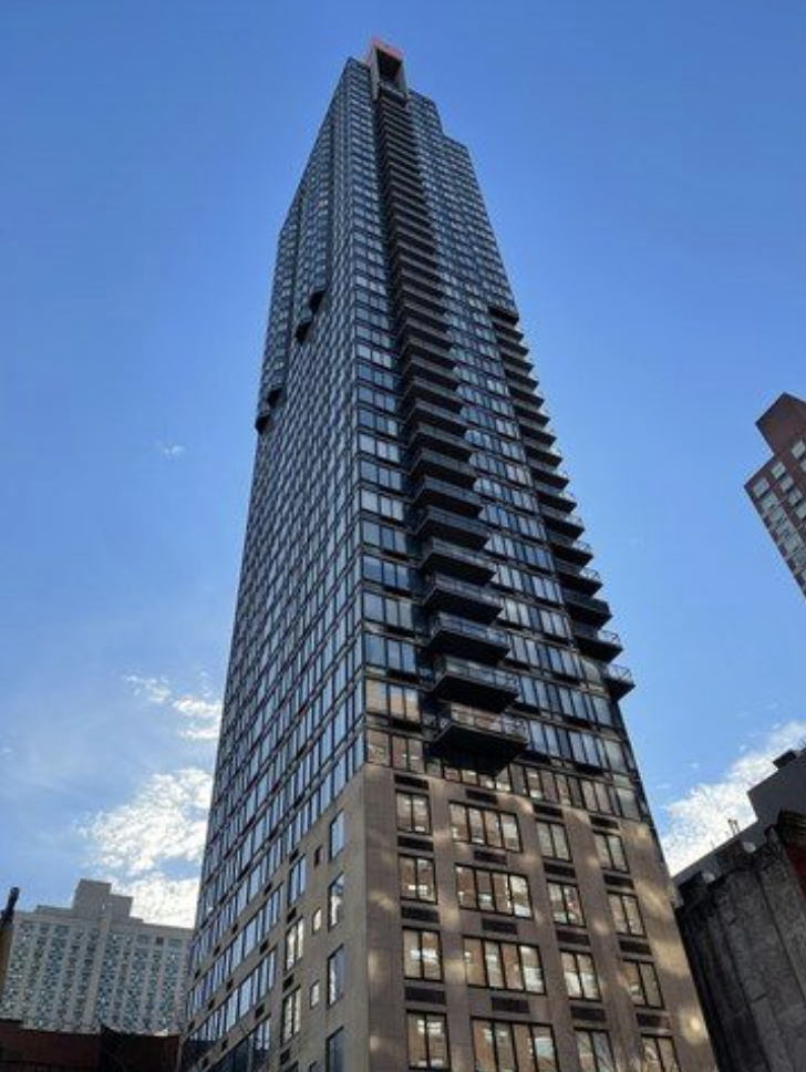 300 East 93rd Street, Unit 18E Manhattan, NY 10128 - Photo 12 of 15 a view of a tall building