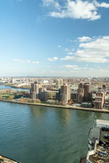 a view of a lake with a city