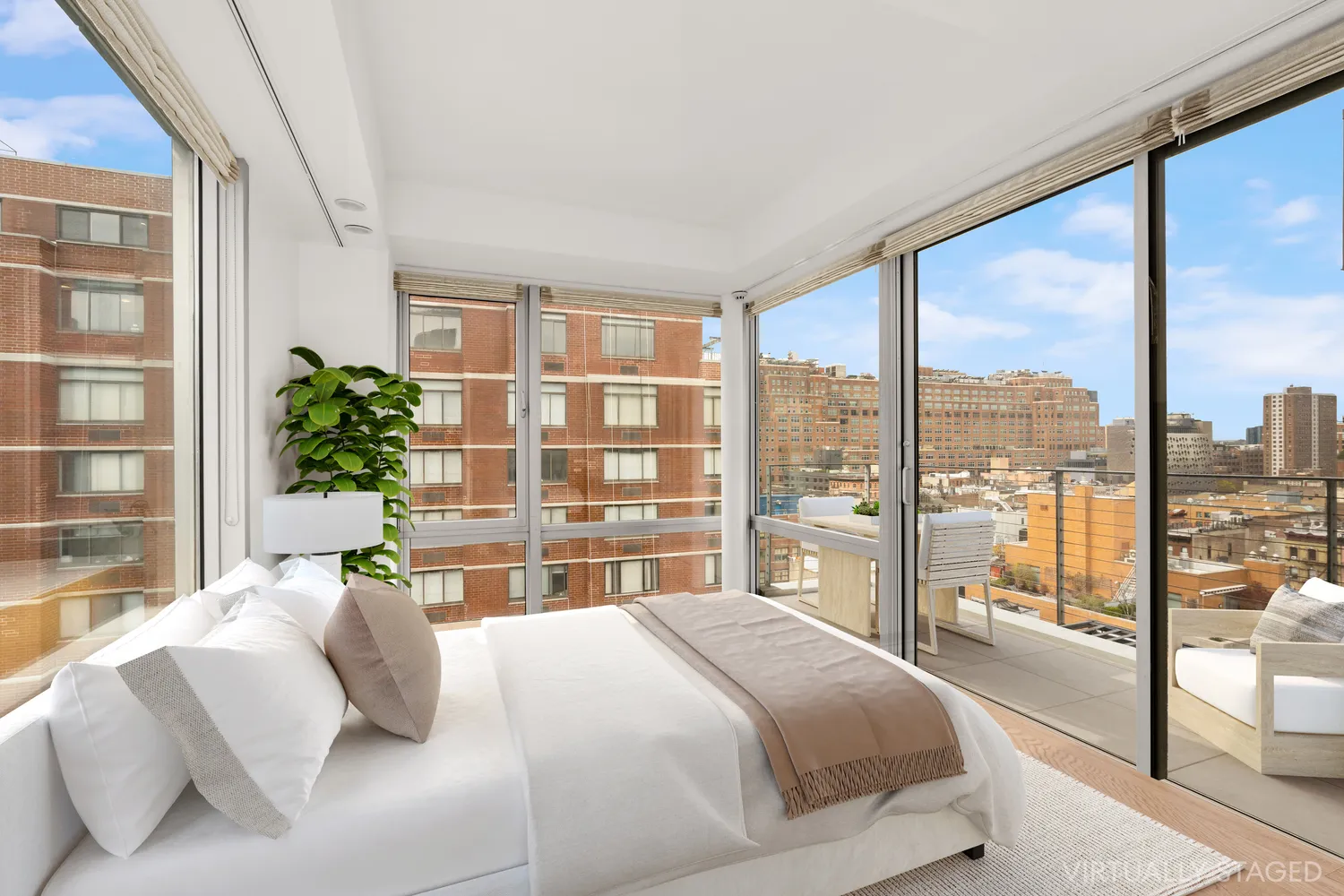 a bedroom with a large bed and a large window