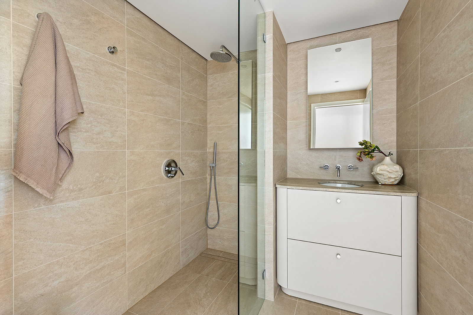 59 Cheever Place Brooklyn, NY 11231 - Photo 22 of 25 a bathroom with a granite countertop shower sink vanity and mirror