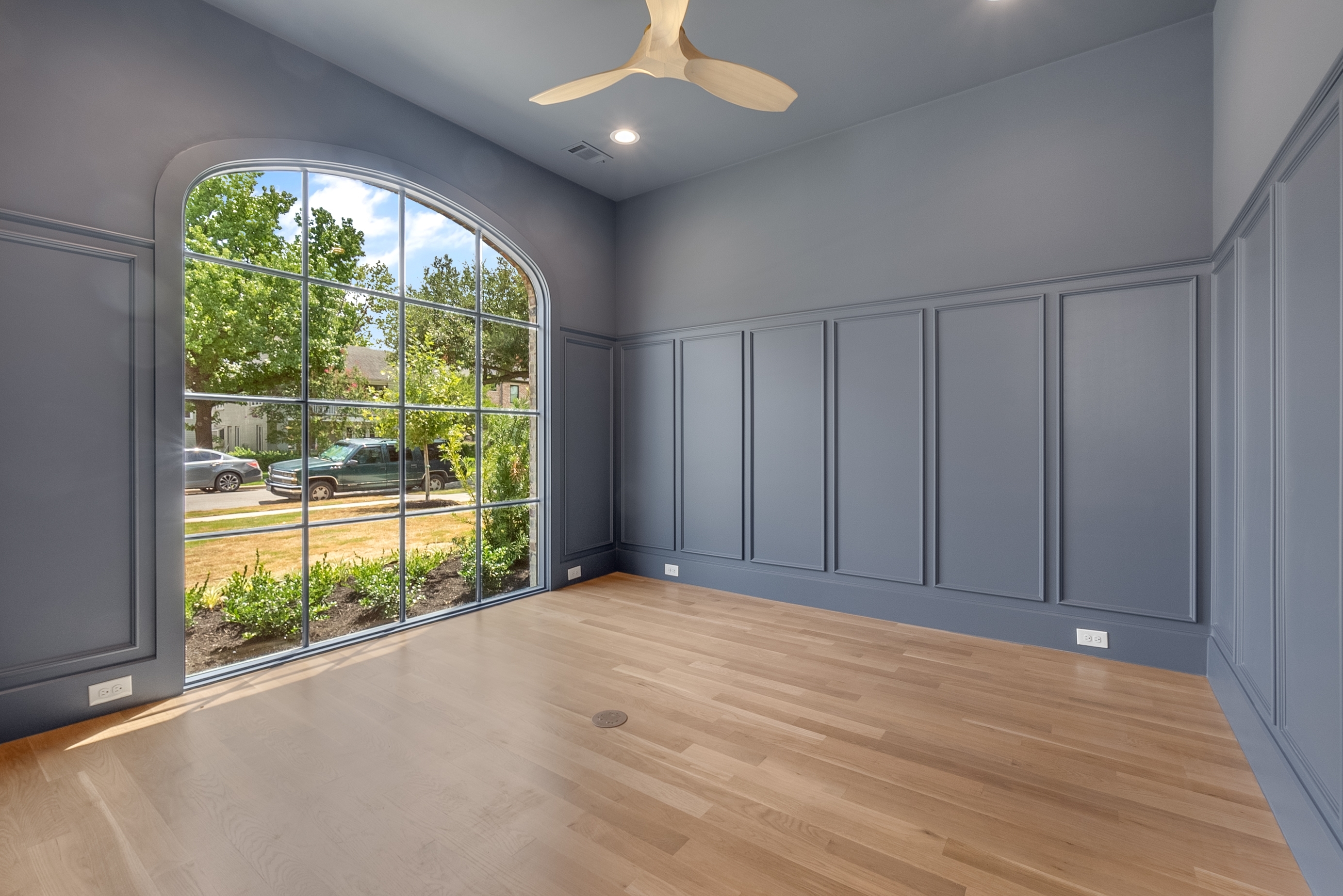 4410 Glenwick Lane Dallas, TX 75205 - Photo 27 of 28 a view of an empty room with wooden floor and a window