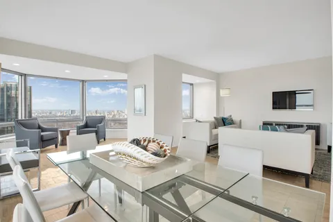 a picture of a bathroom with a shower and a mirror